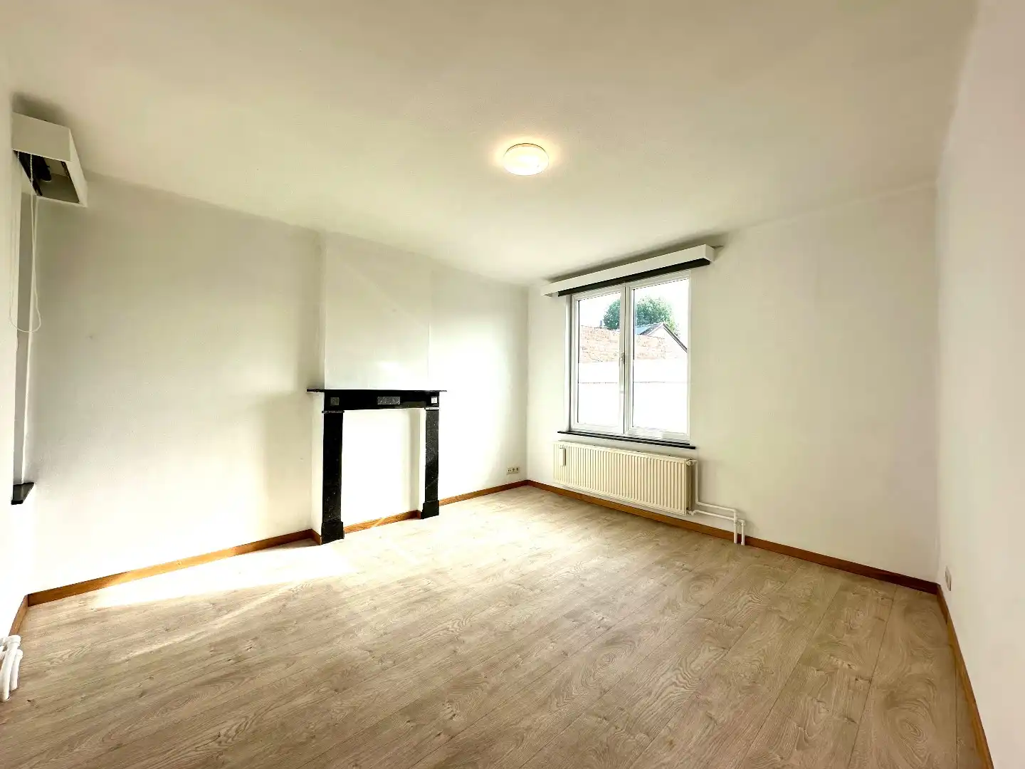 Woning met 2 ruime slaapkamers in het centrum van Bilzen. foto 14