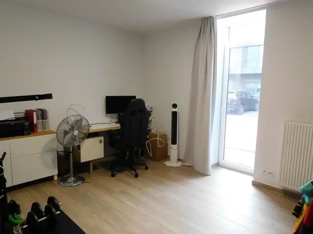 Rustig gelegen gelijkvloers appartement met tuin en carport foto 11