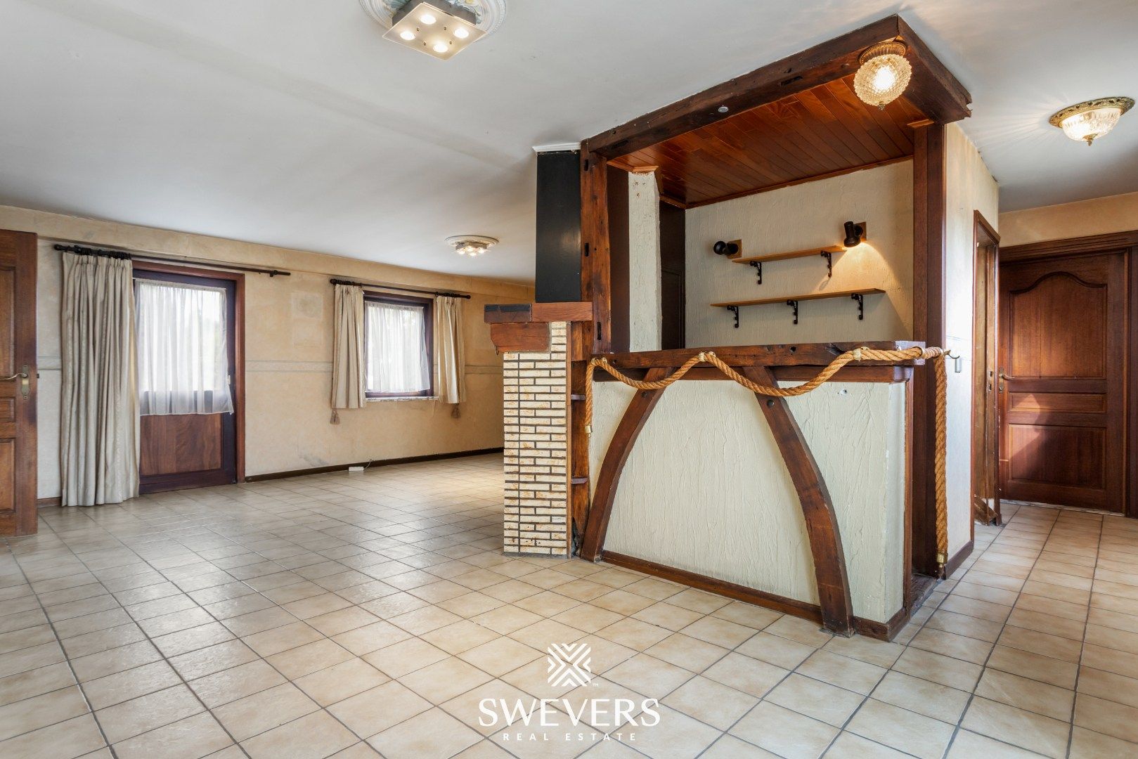 Te renoveren woning met veel potentieel op toplocatie te Diepenbeek foto 6