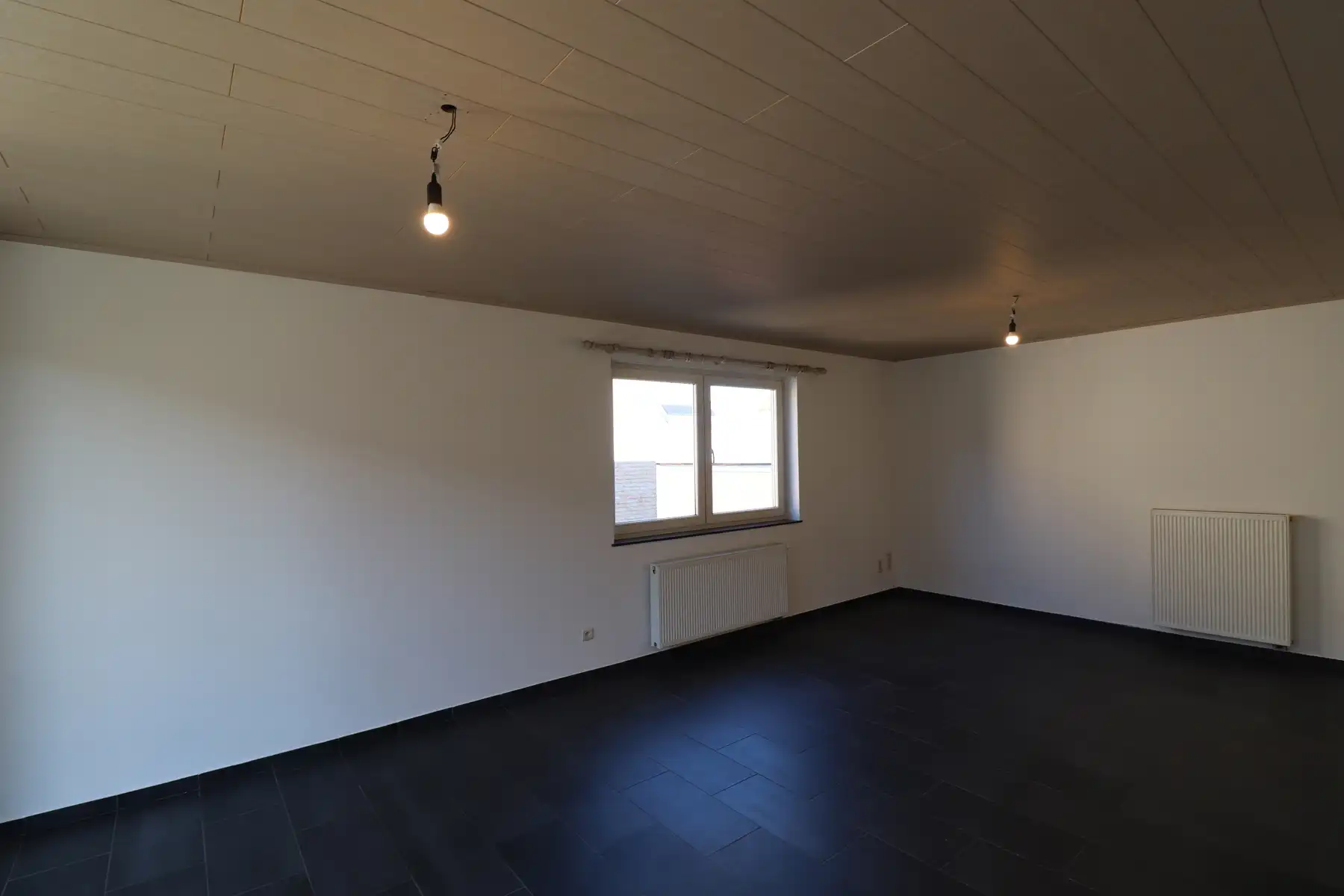 Ruim 2-slaapkamerappartement met terras en lift op de 1ste verdieping links met garage foto 4