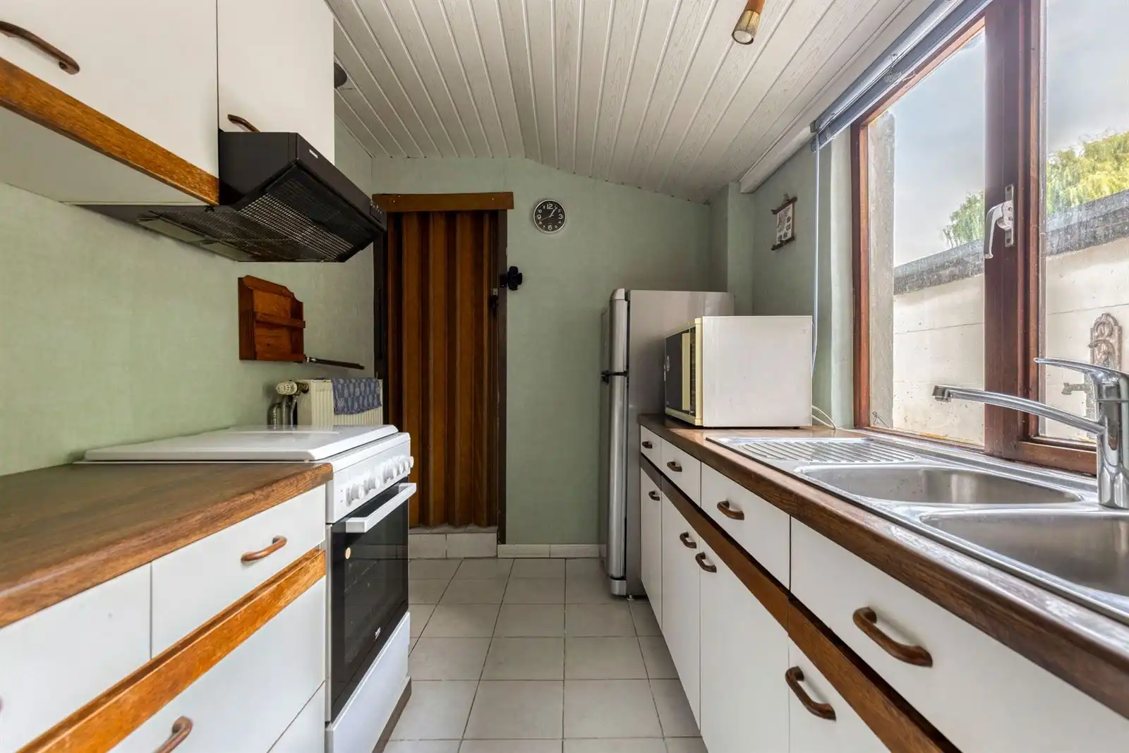 Te renoveren 3-gevelwoning met mogelijks 4 slaapkamers + garage foto 10