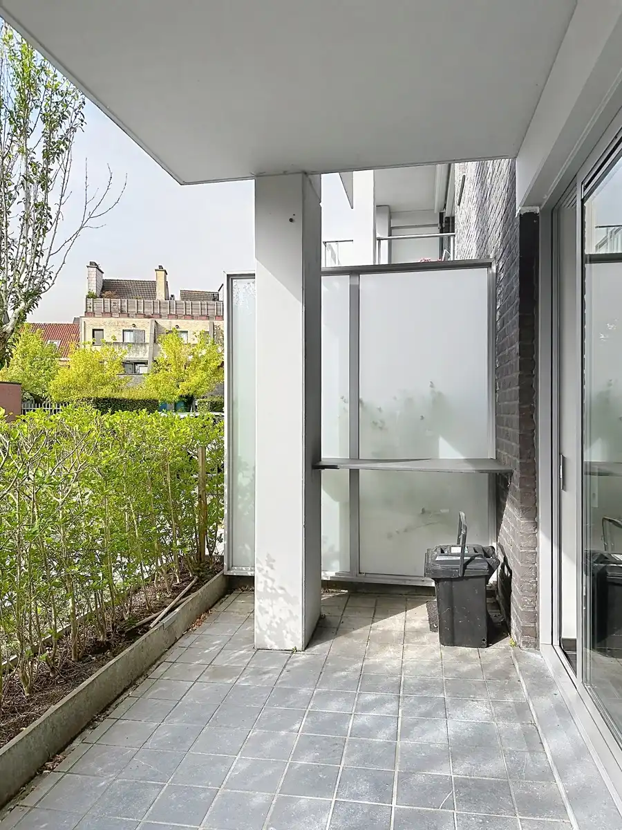 Instapklaar gelijkvloers met twee slaapkamers en ondergrondse staanplaats foto 15