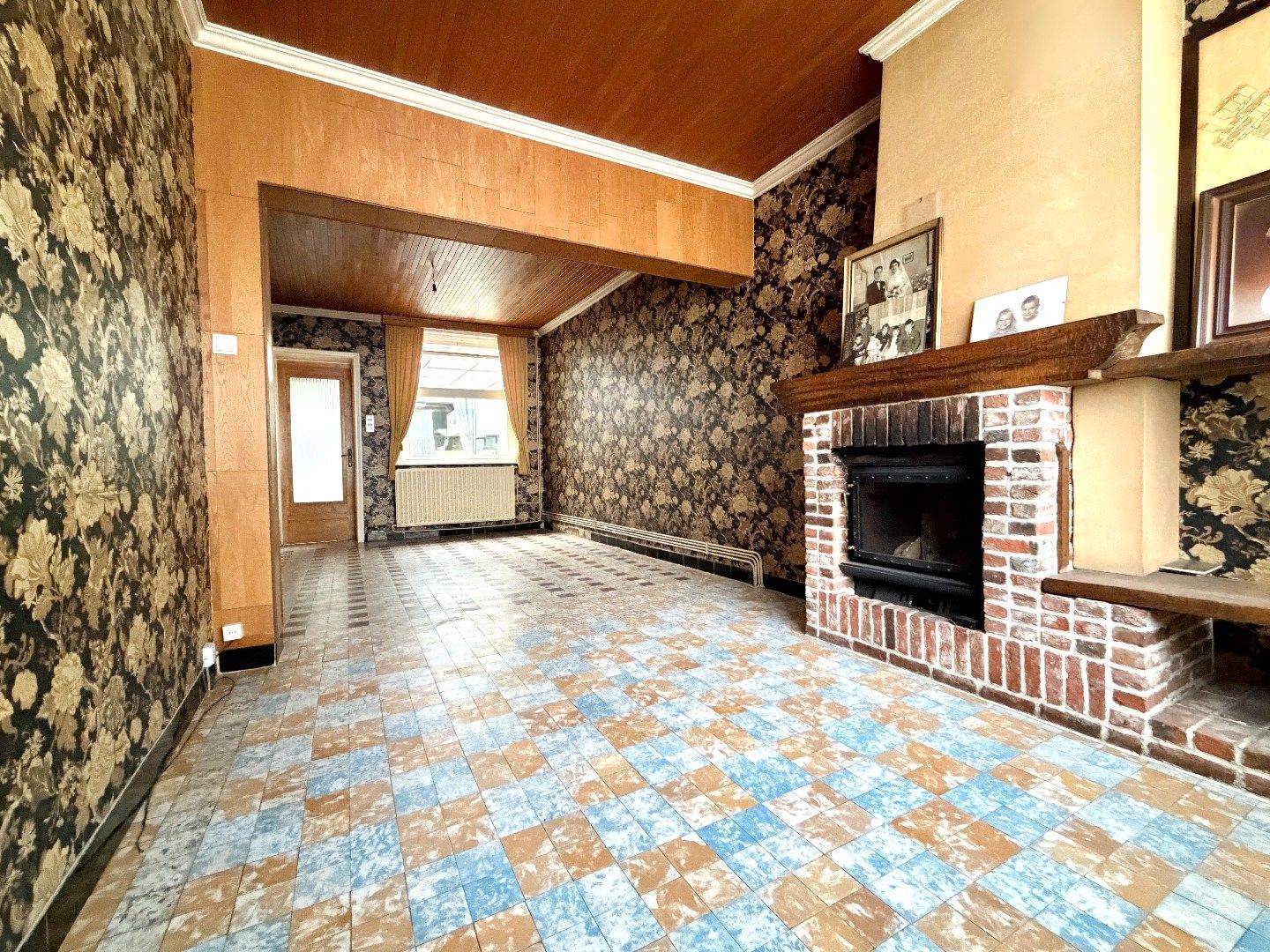 Te renoveren rijwoning met 4 slaapkamers en tuin in Kortrijk foto 4