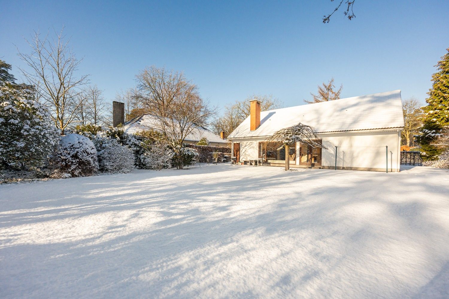 Hoofdfoto van de publicatie: Te renoveren vrijstaande woning op zuid georiënteerd perceel te  ’s-Gravenwezel, wijk Zonnebos