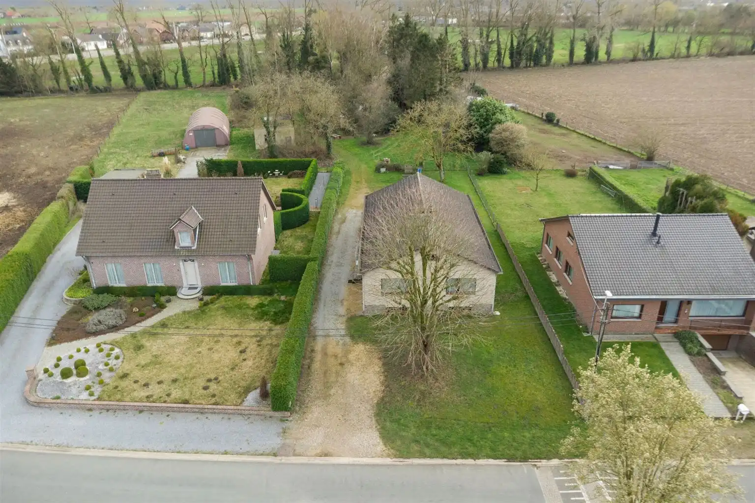 Vrijstaande woning op een uitzonderlijk perceel van 29a95ca met 4 slaapkamers en inpandige garage, gelegen op een rustige toplocatie nabij het centrum van Maaseik. foto 32