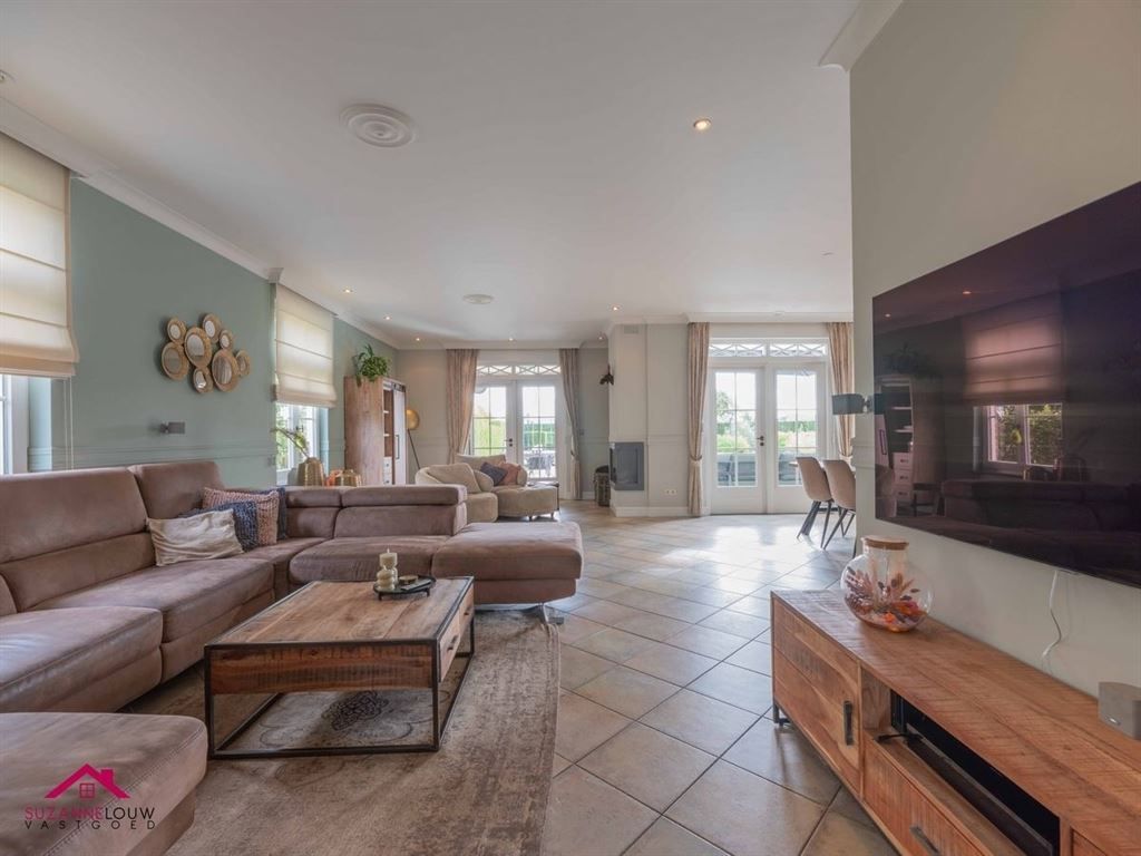 Landelijke villawoning met dubbele vrijstaande garage foto 23