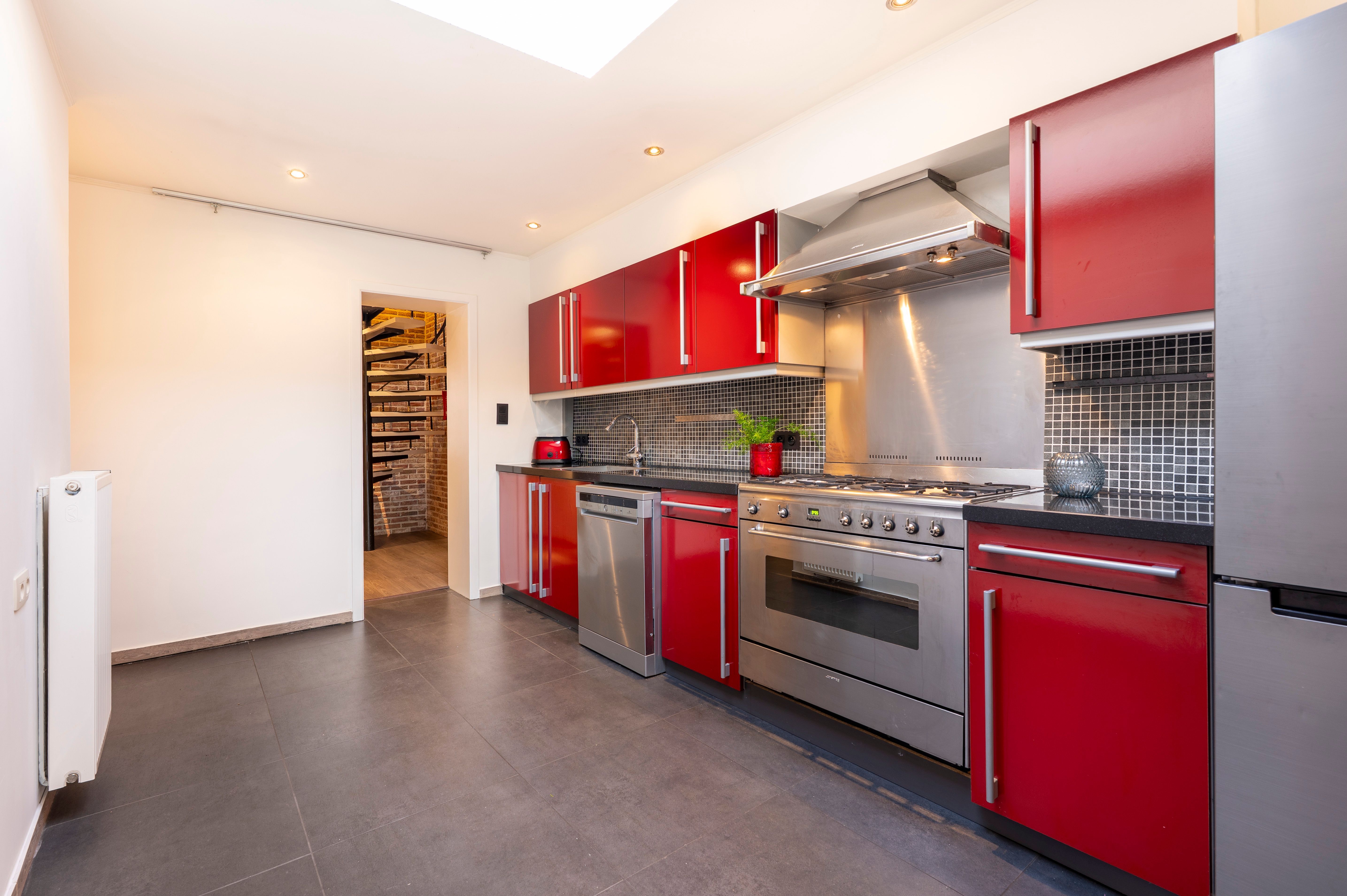 Verrassende woning met leuke tuin en grote garage nabij centrum Kapellen! foto 9