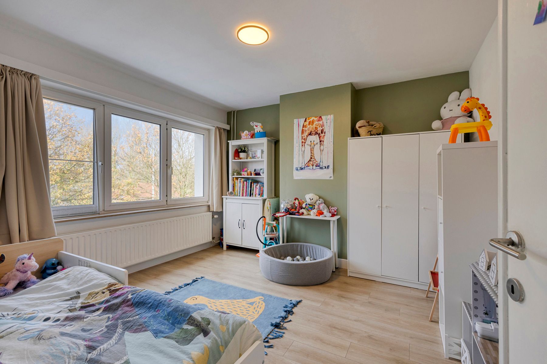 Instapklare woning met 3 slaapkamers, garage en tuin! foto 11