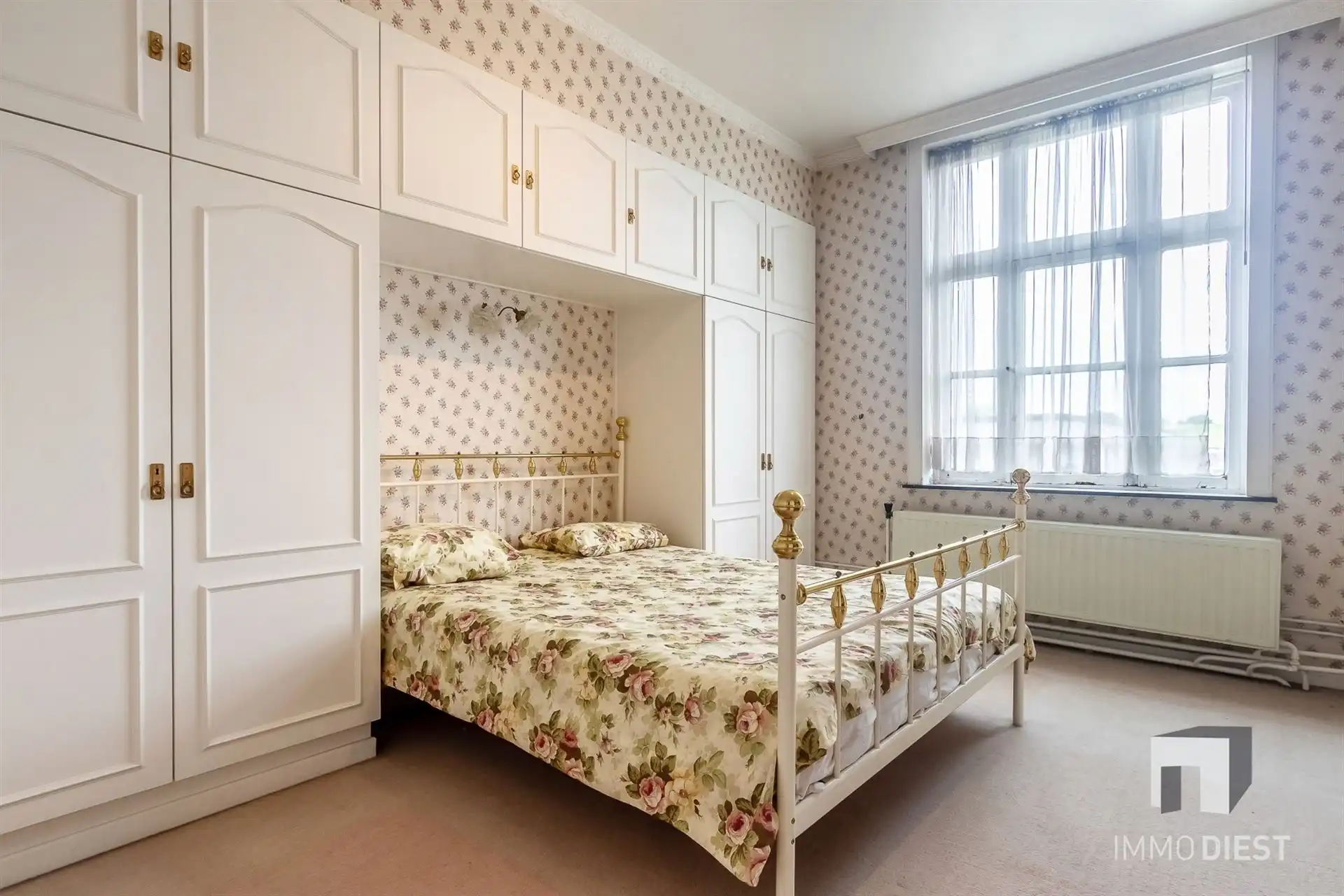 Elegante woning met vele mogelijkheden, gezellige tuin en dubbele garage foto 12