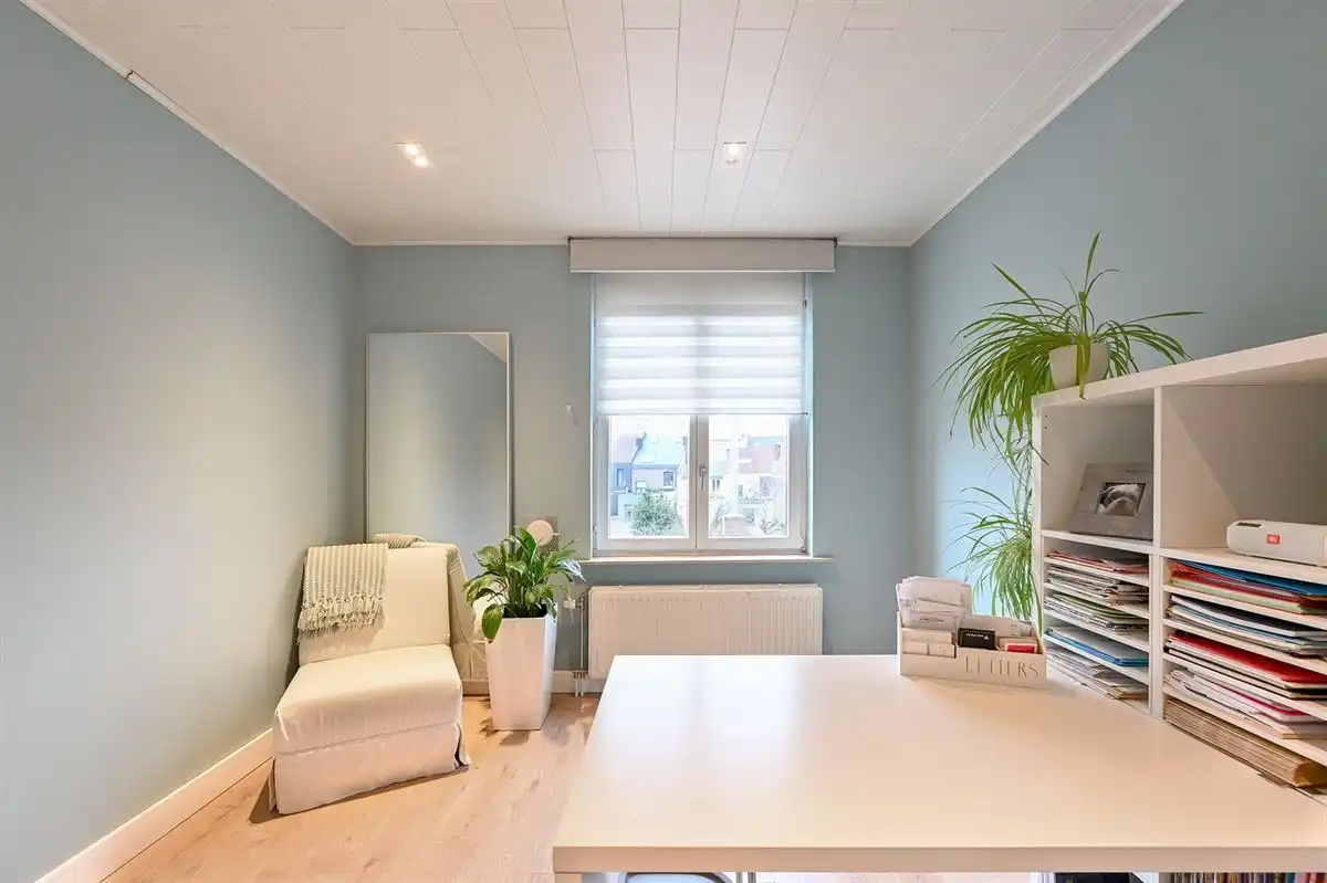 Mooie en gerenoveerde woning in populaire straat te Borgerhout foto 10