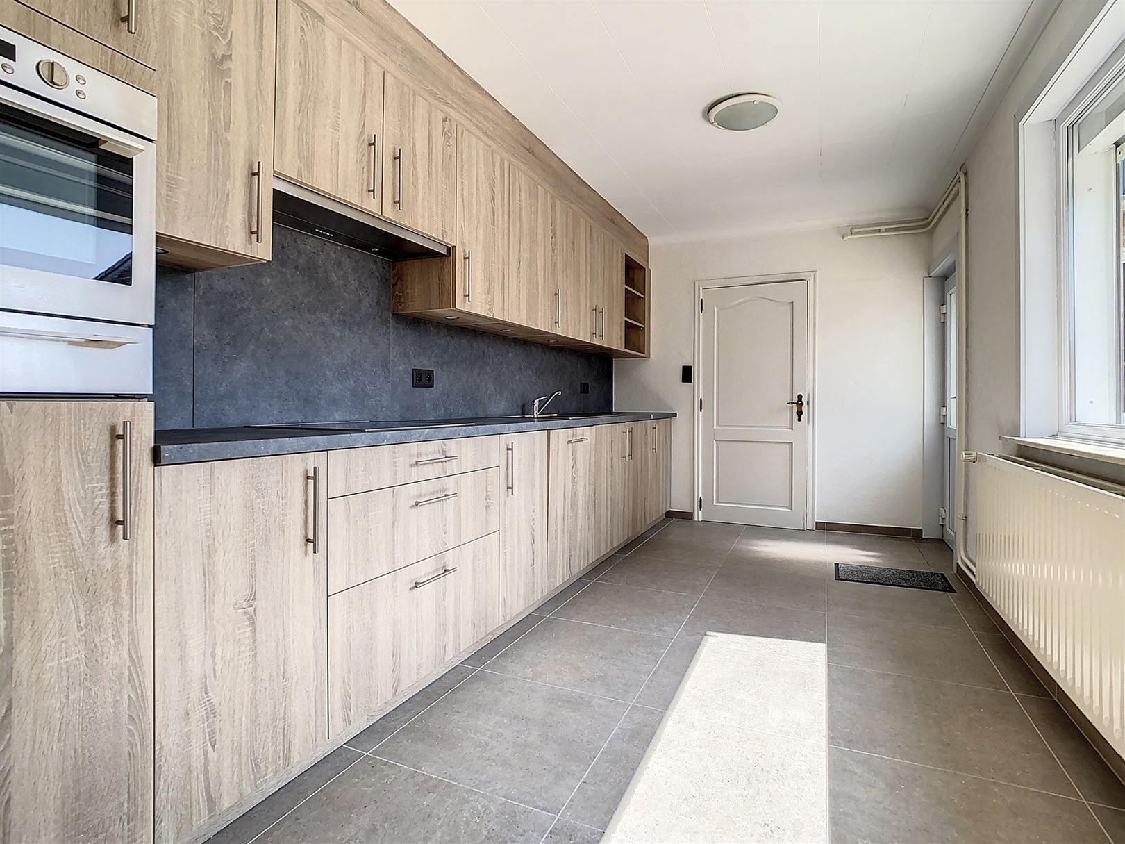 Instapklare woning, 2 slpks, tuin en garage foto 35