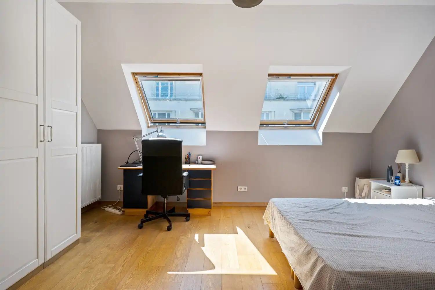 Ruim duplex appartement met 2 slpkrs op een toplocatie in Elsene foto 9