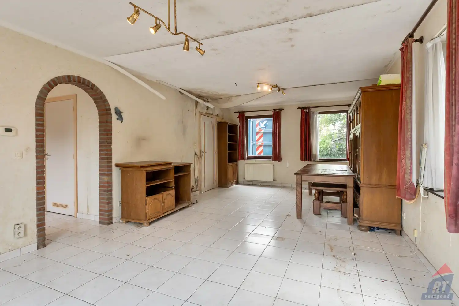 Te renoveren halfopen bebouwing met 3 slaapkamers, garage en tuin op rustige ligging in Ulbeek foto 4