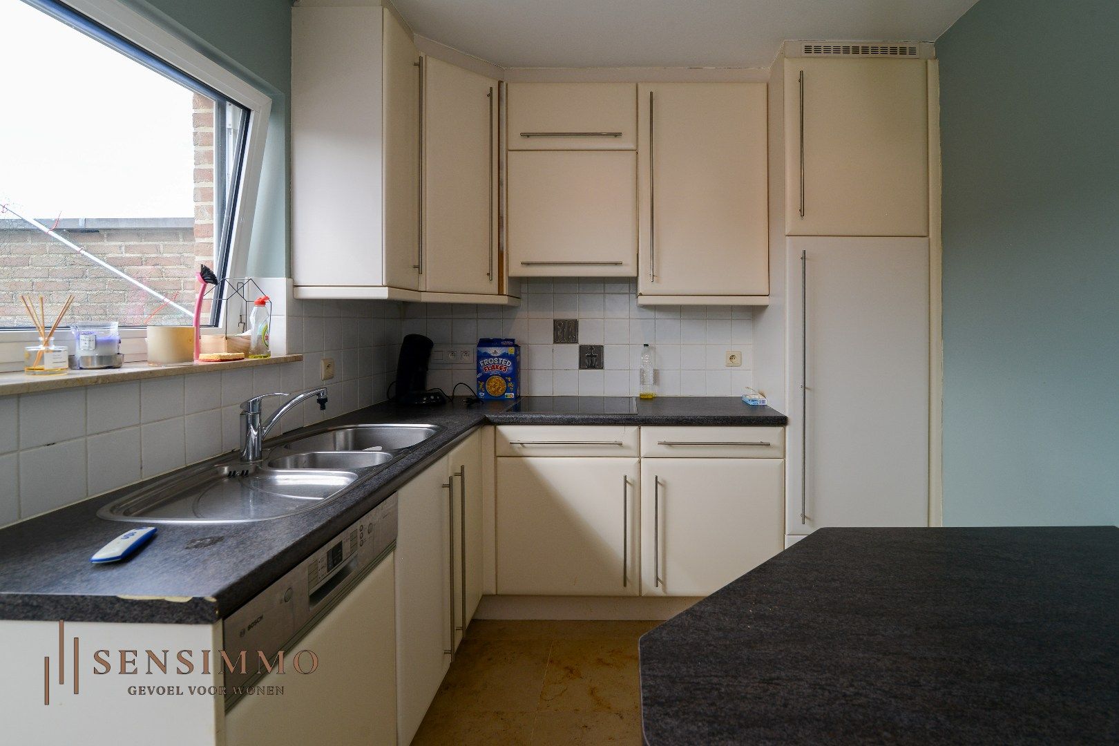 INVESTEERDERSOPPORTUNITEIT - GEBOUW MET TOONZAAL + 4 APPARTEMENTEN + MAGAZIJN + GARAGEBOXEN + BOUWGROND foto 29