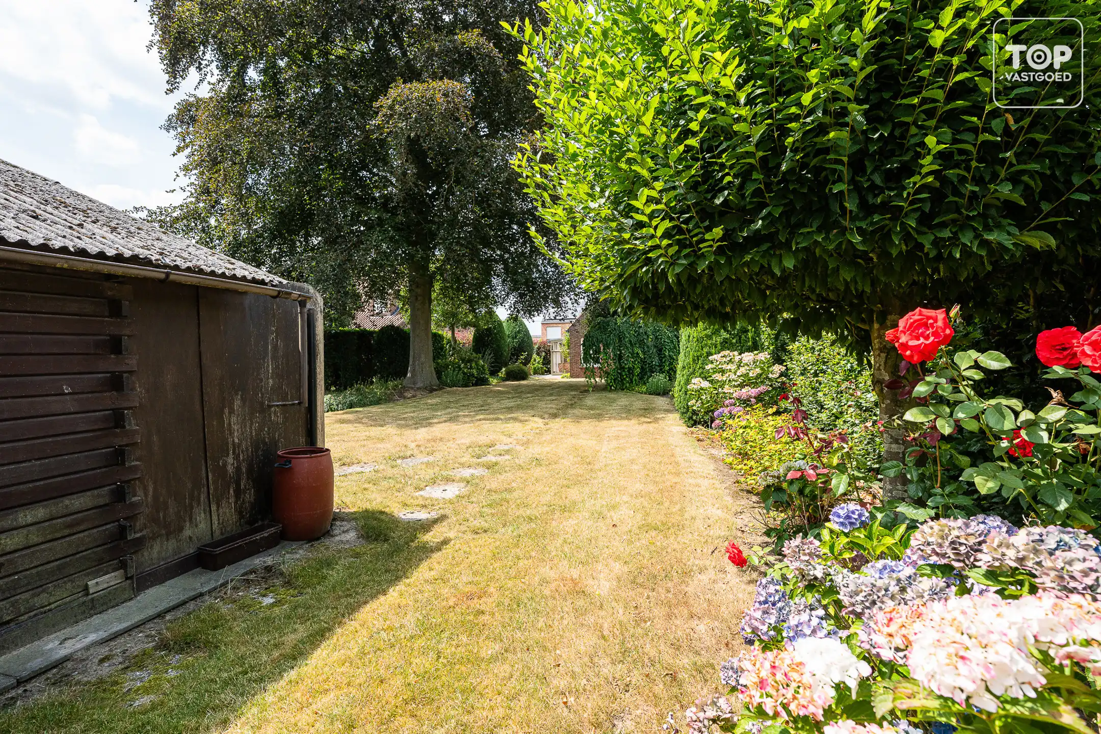 Rustig gelegen woning met ruime tuin, bos en prachtig open uitzicht foto 25