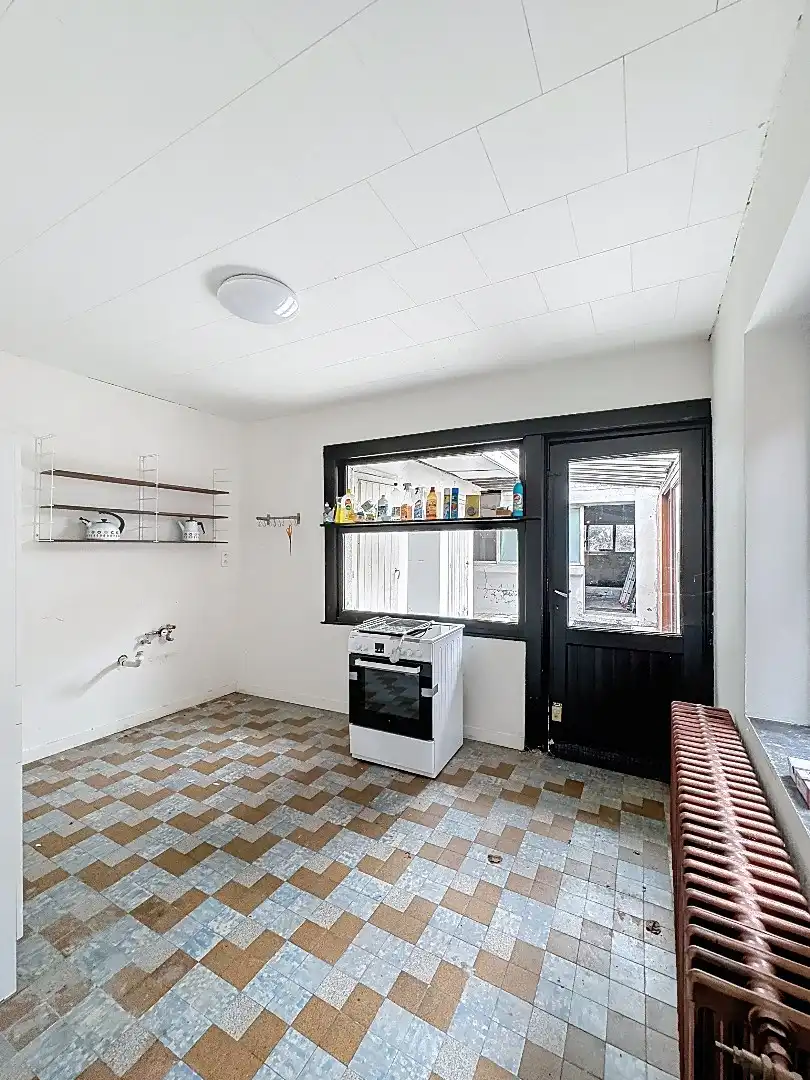 IN OPTIE! Charmant pand met handelsruimte en woonst in hartje Tienen foto 6