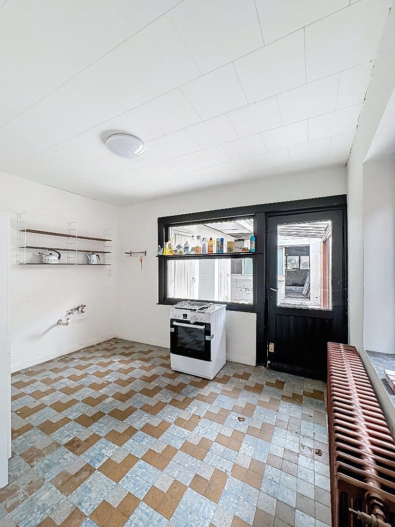 Charmant pand met handelsruimte en woonst in hartje Tienen foto 6