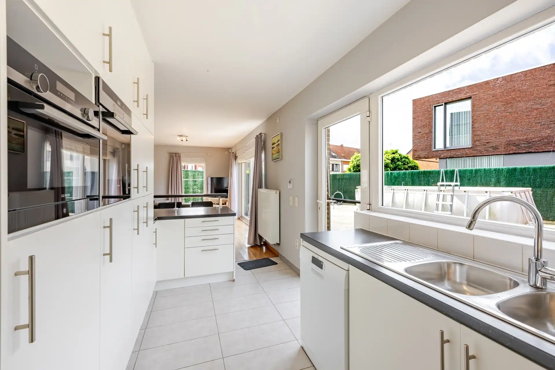 Instapklare halfopen bebouwing met 3 slaapkamers, zonnepanelen en zonnige tuin te Aalst foto 11