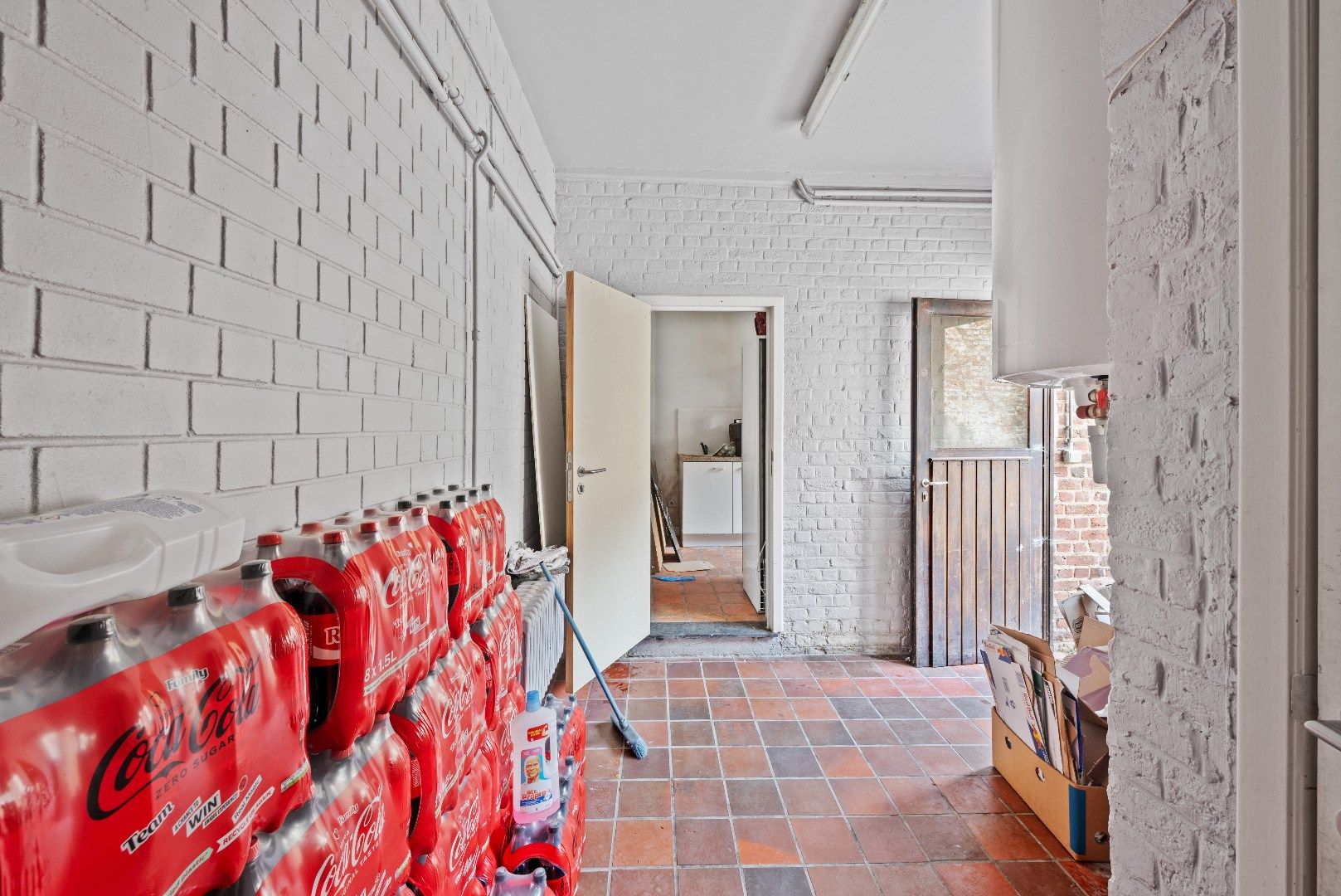 Opbrengsteigendom met 2 appartementen en een handelspand in het hart van Tienen foto 7
