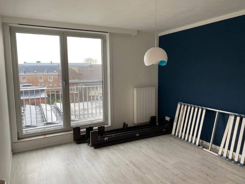Ruim (±100m²) app met 2 slpk en autostaanplaats in hartje Geel foto 15