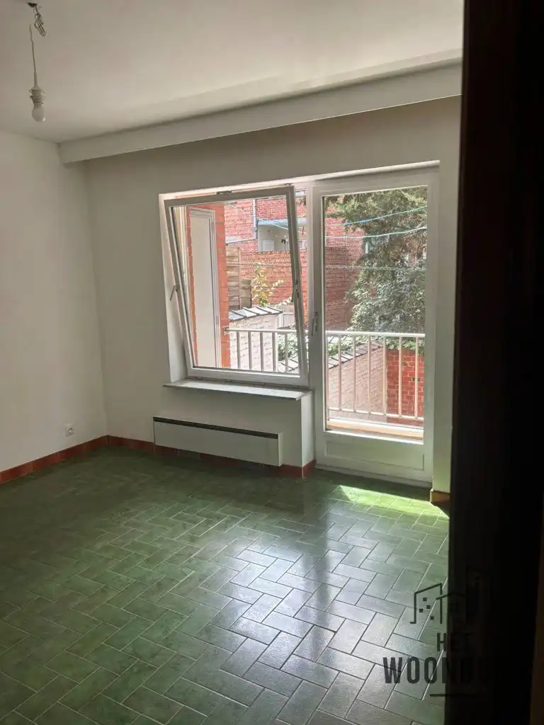 Appartement 1e verd. met terras en kelder foto 10