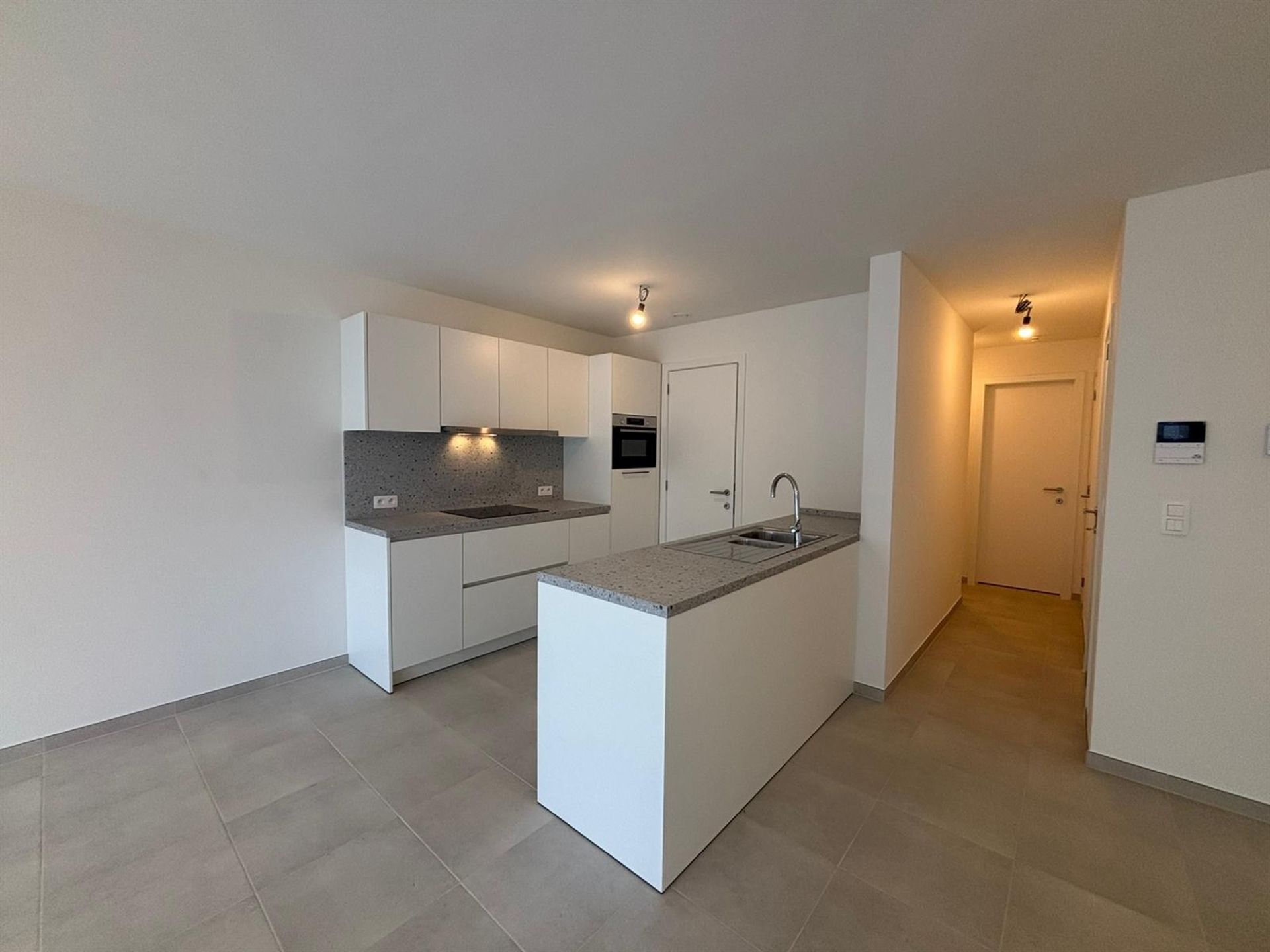 Modern gelijkvloers appartement met private tuin en ruime terrassen in Asse! foto 8