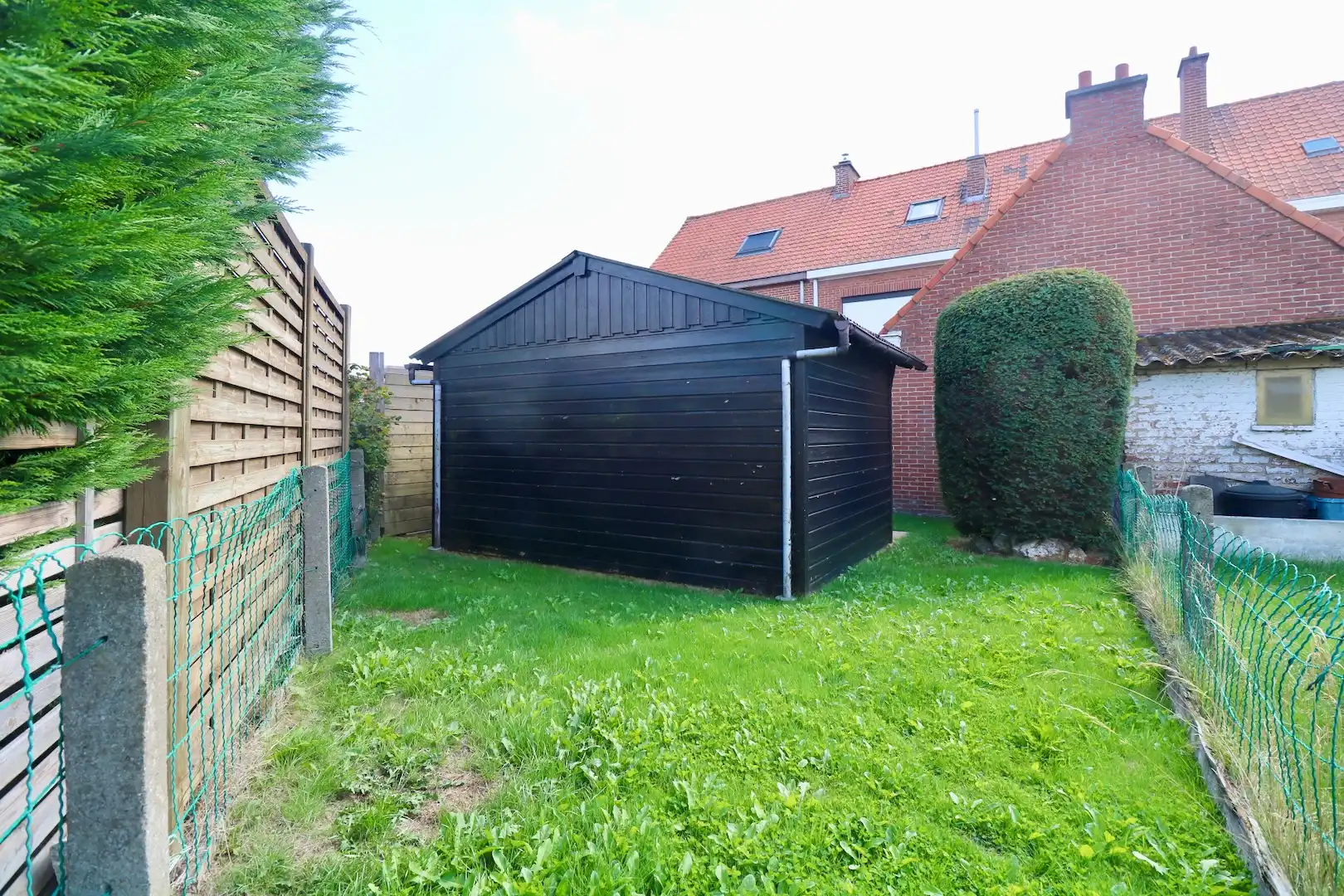 Goed onderhouden woning met tuin en garage in centrum Aalbeke. foto 10