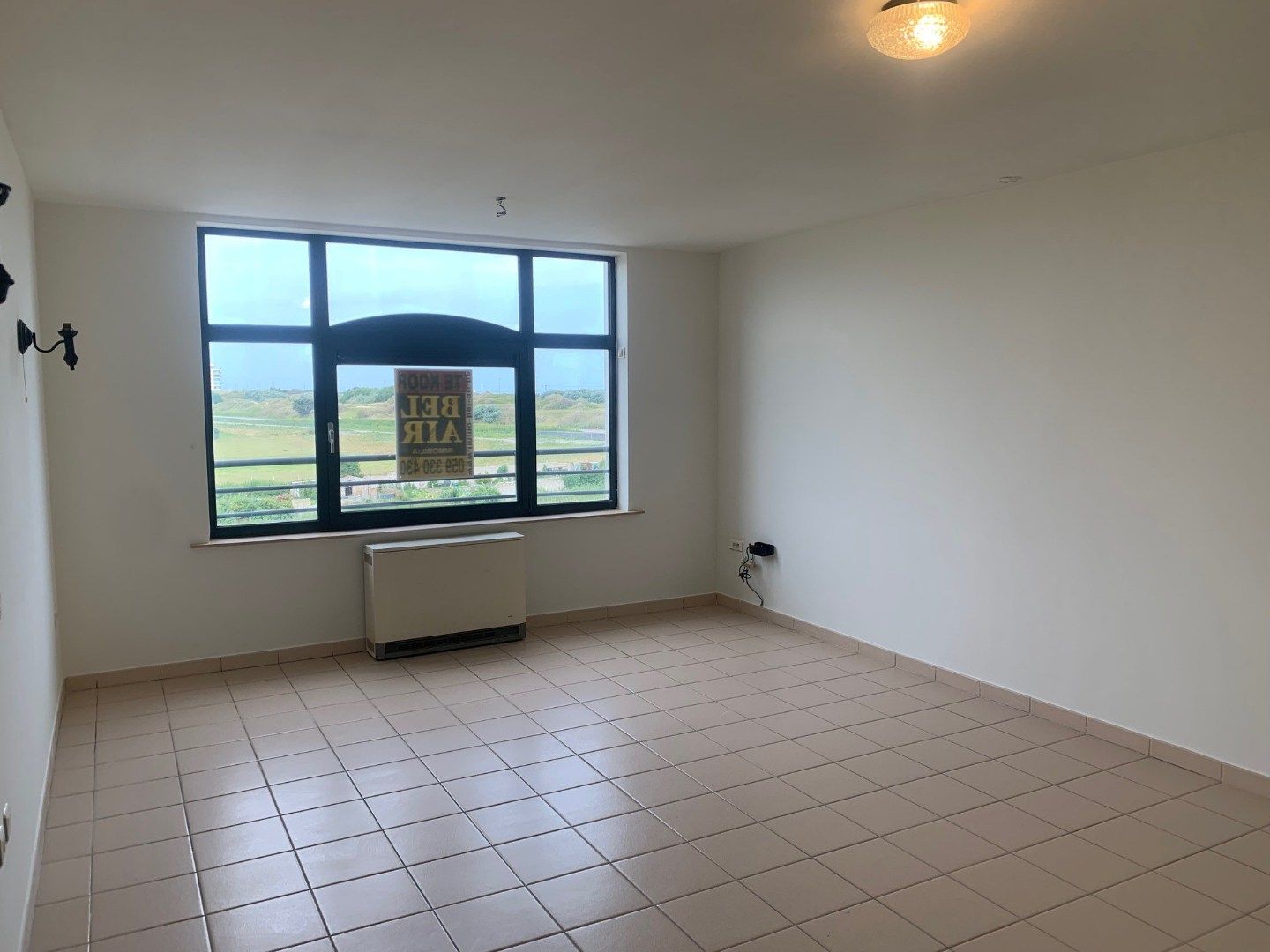 Niet gemeubelde studio met prachtig zicht op polders, strand en duinen foto 3