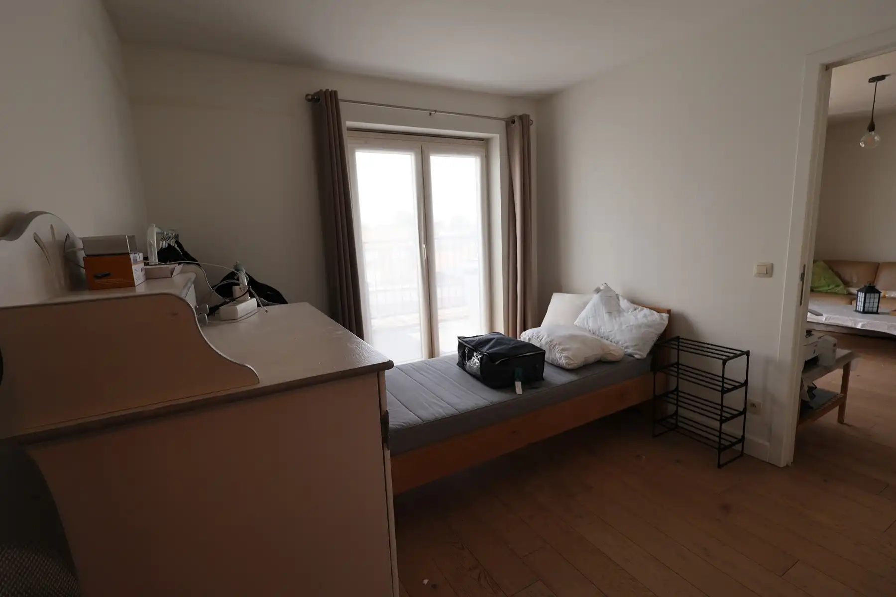 Appartement op de tweede verdieping achteraan met 1 slaapkamer, terras, autostaanplaats en lift in het gebouw. foto 5