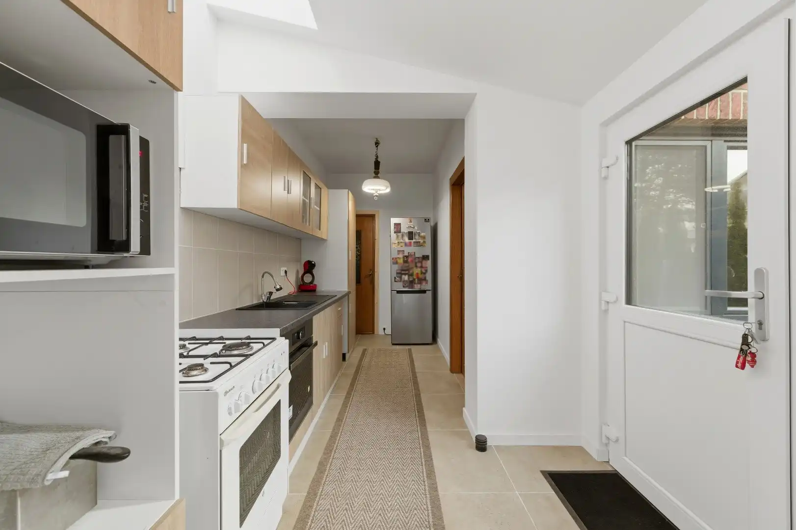 Instapklare halfopen bebouwing met 2 slaapkamers en ruime tuin foto 9