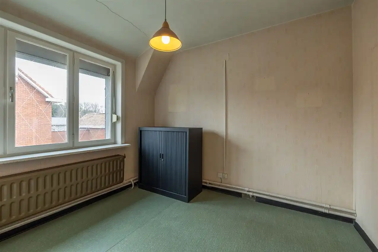 Vlakbij ingang merodebossen, soldie woning met potentieel foto 19