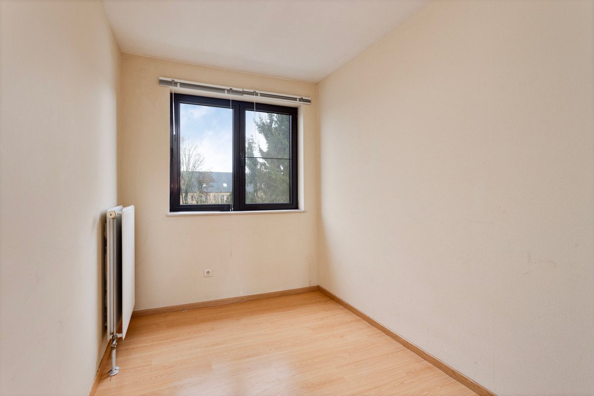 Perfect investeringspand (2 app) met onmiddellijk rendement te koop in hartje Sint-Truiden! foto 12