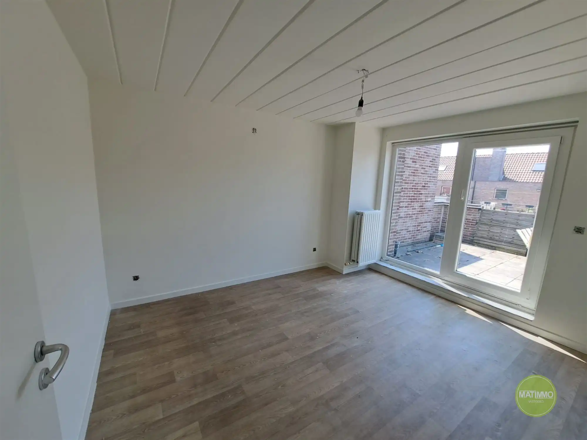 Duplex appartement met 2 slaapkamers en ruim terras te Mol. foto 7
