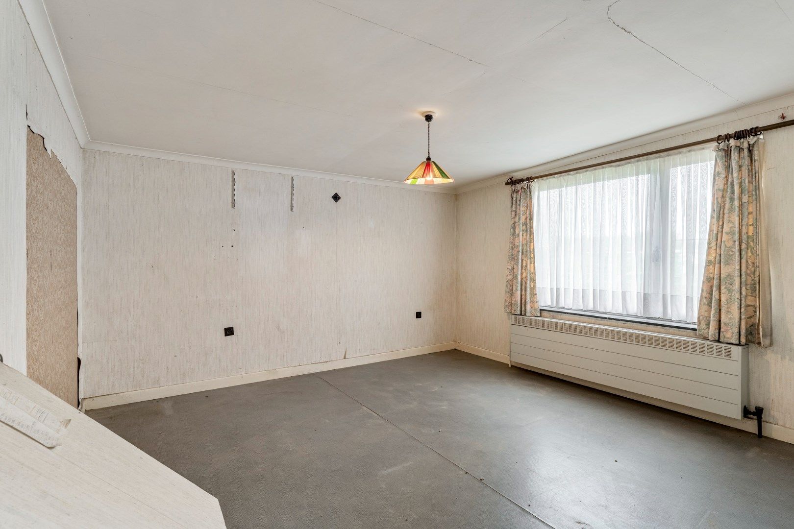 Te renoveren vrijstaande woning op een gunstig gelegen perceel van 12a 07ca vlakbij het centrum foto 23