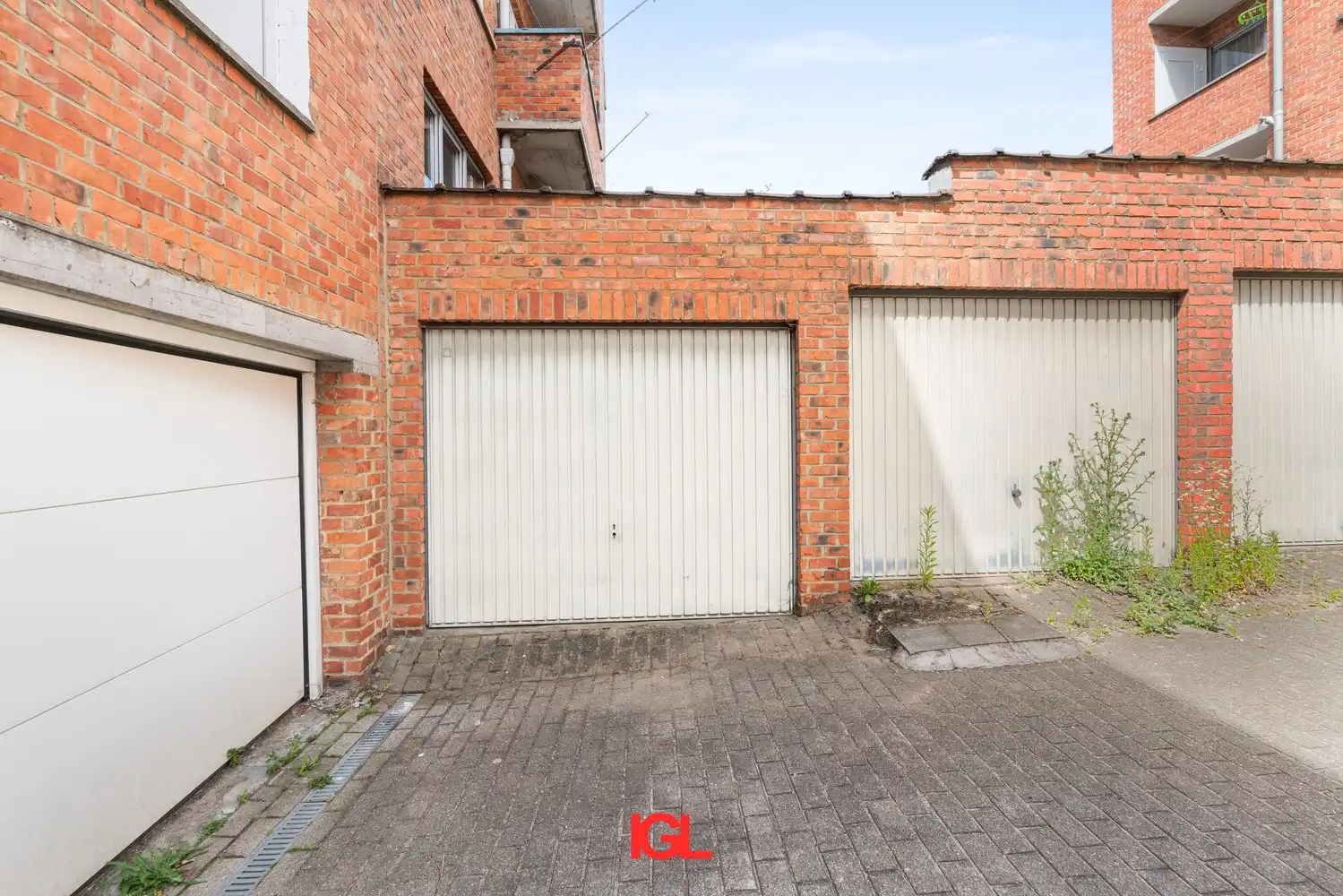 Gerenoveerd gelijkvloers appartement met 2 slaapkamers en garage. foto 13