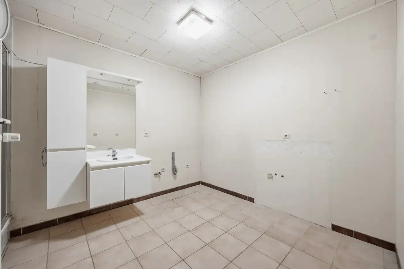 1 rijwoning en 2 appartementen in gezellig Hoegaarden foto 7