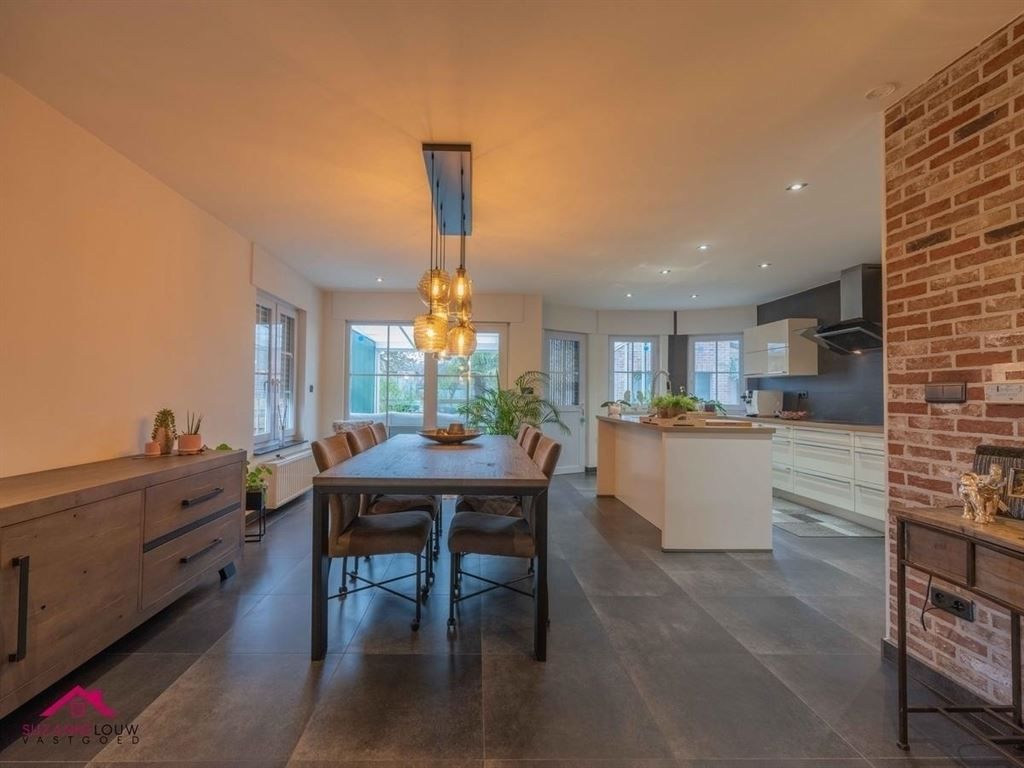 Stijlvolle vrijstaande woning met ruimte voor vrij beroep, garage en verwarmd zwembad op ruim perceel foto 15