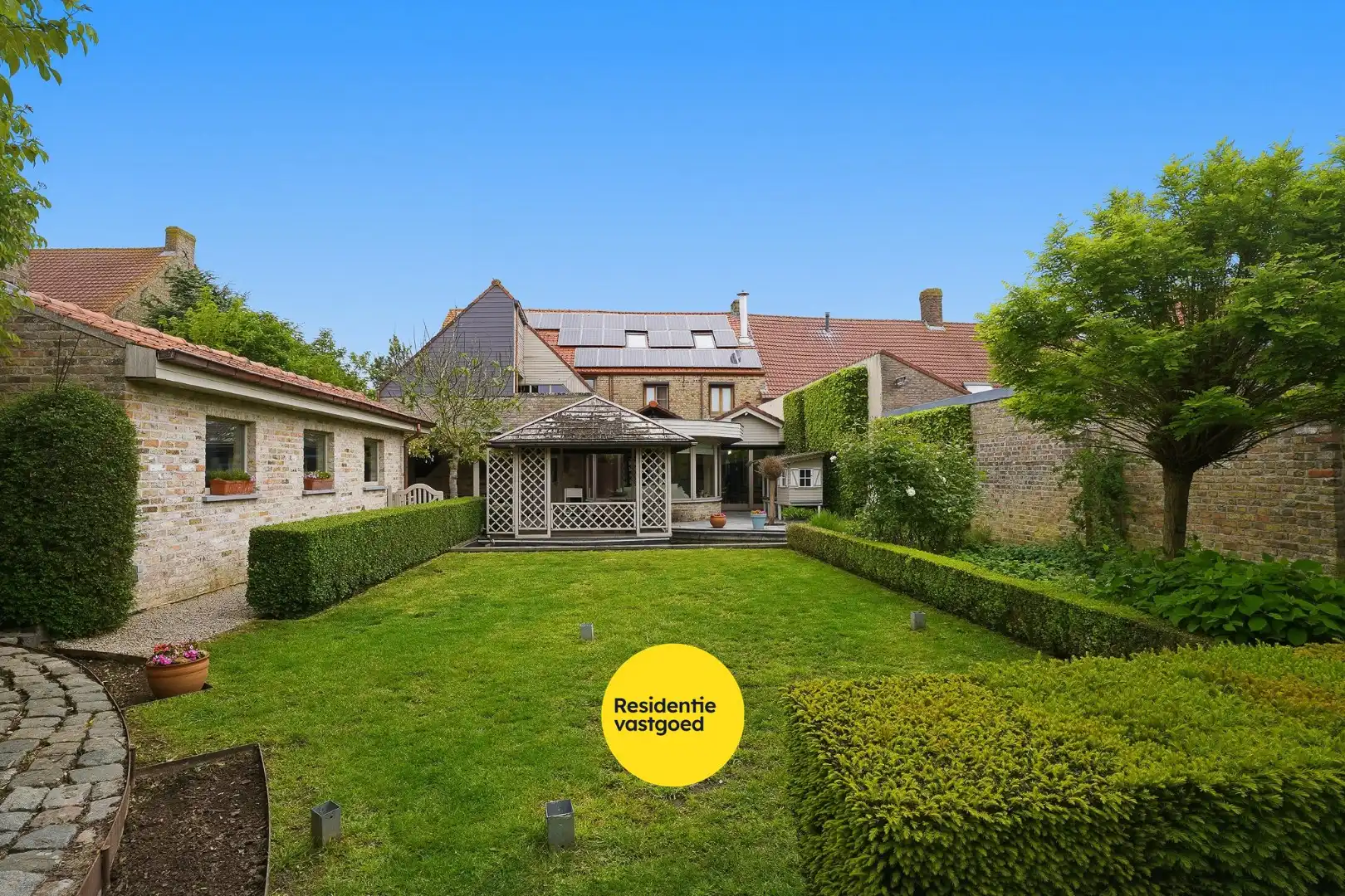 Unieke woning met polyvalente ruimte en zonnige tuin. foto 22