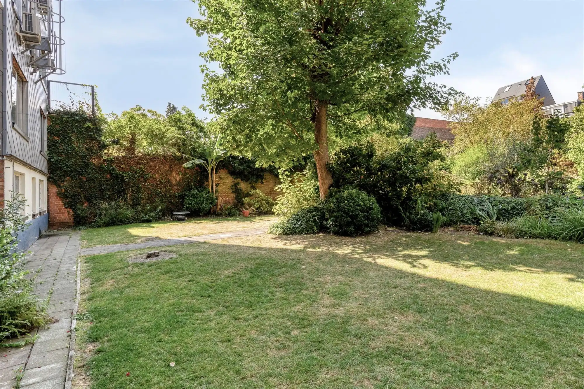 Lichtrijk appartement met 1 slaapkamer en gemeenschappelijke tuin foto 10