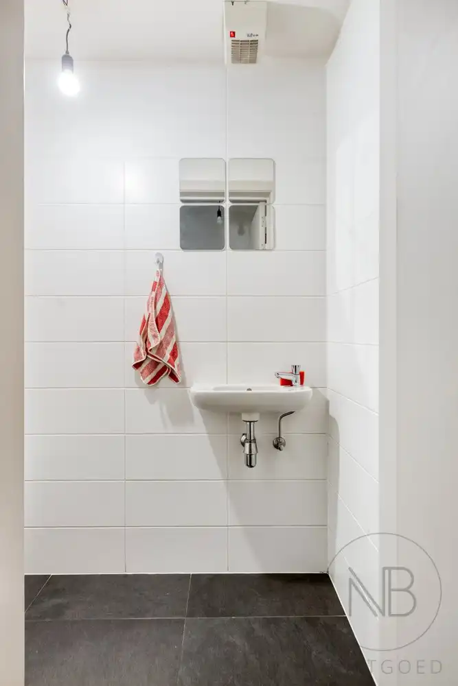 Ruim duplex appartement met 3 slaapkamers en groot terras in hartje Zutendaal foto 12