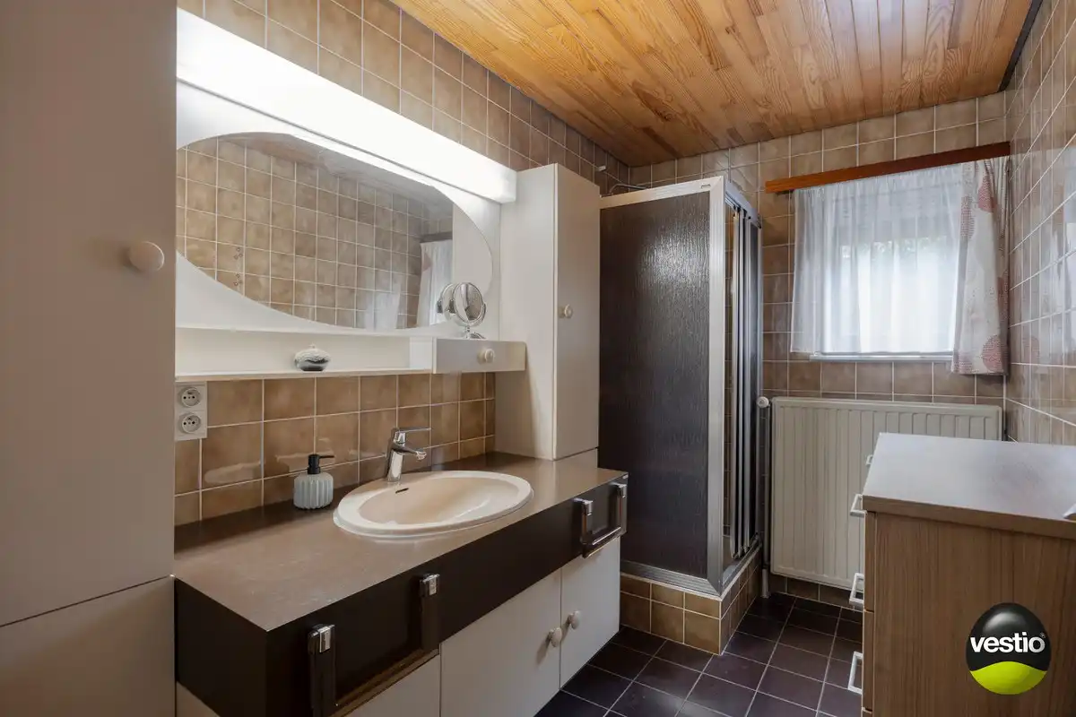 Gelijkvloerse woning met 3 slaapkamers, zonnepanelen en tuin op residentiële, rustige ligging. foto 12