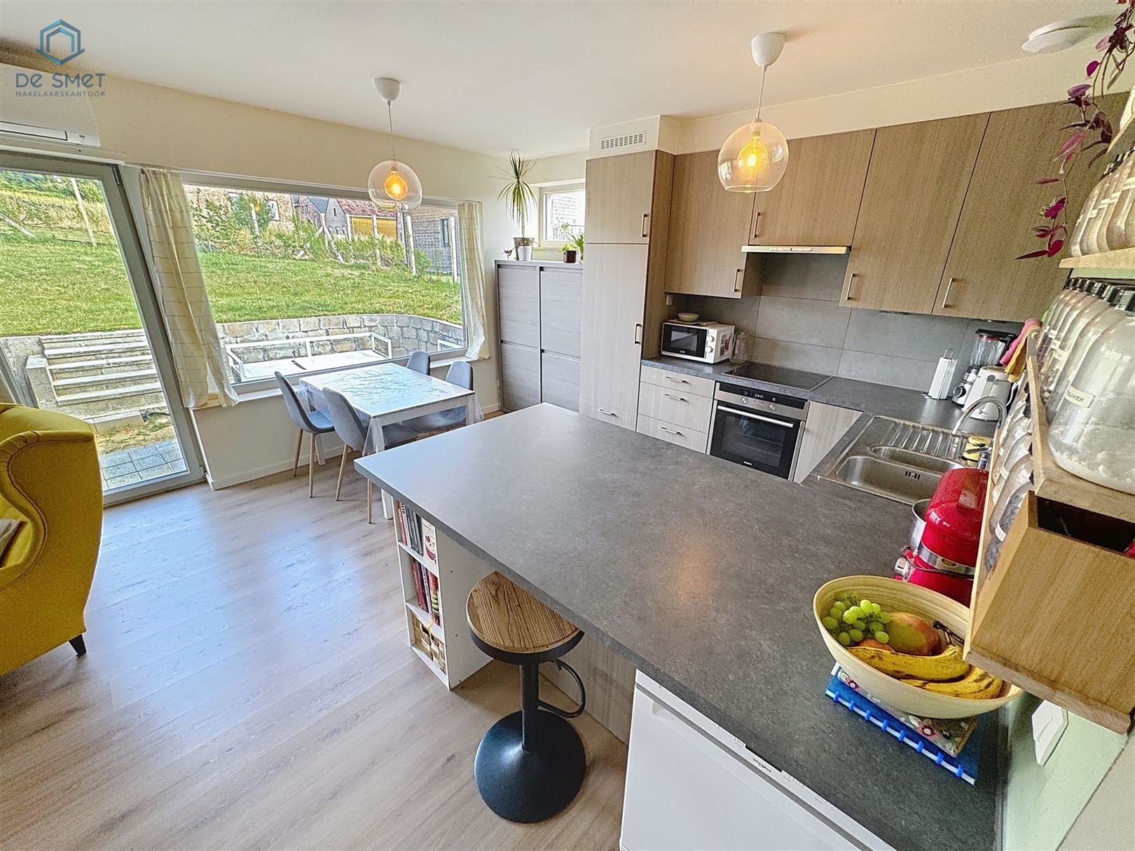 Recente, energiezuinige woning in groene oase 2 slaapkamers, garage en tuin foto 3