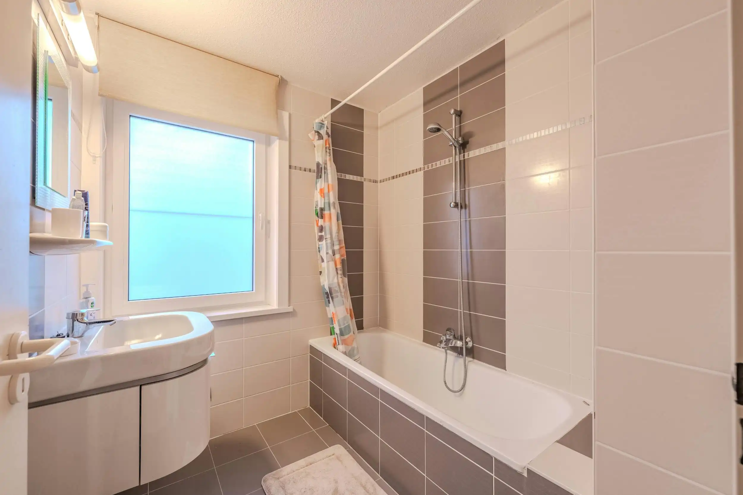 Instapklare rijwoning met zonnige tuin te Oostende foto 8