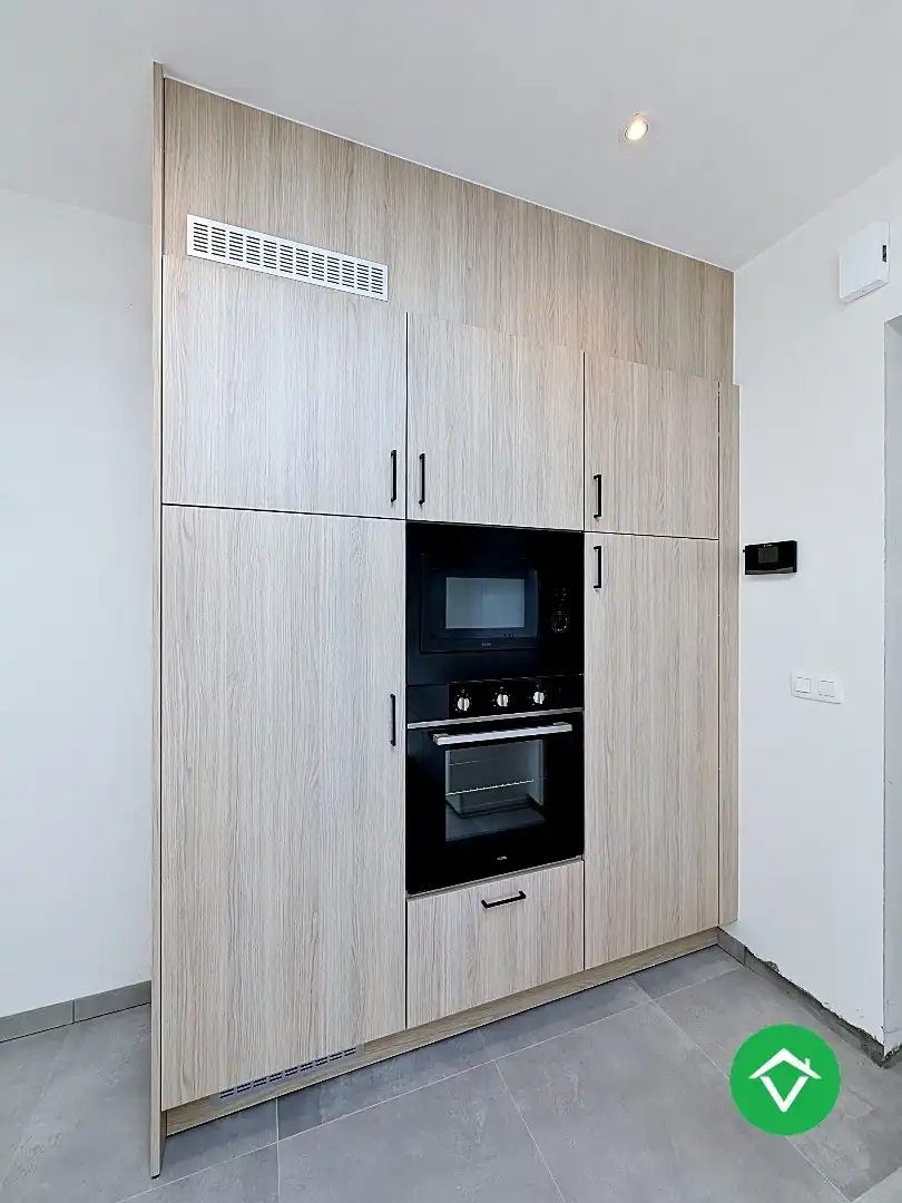 Centraal gelegen nieuwbouwwoning met 3 slaapkamers, tuin en overdekte autostaanplaats foto 6
