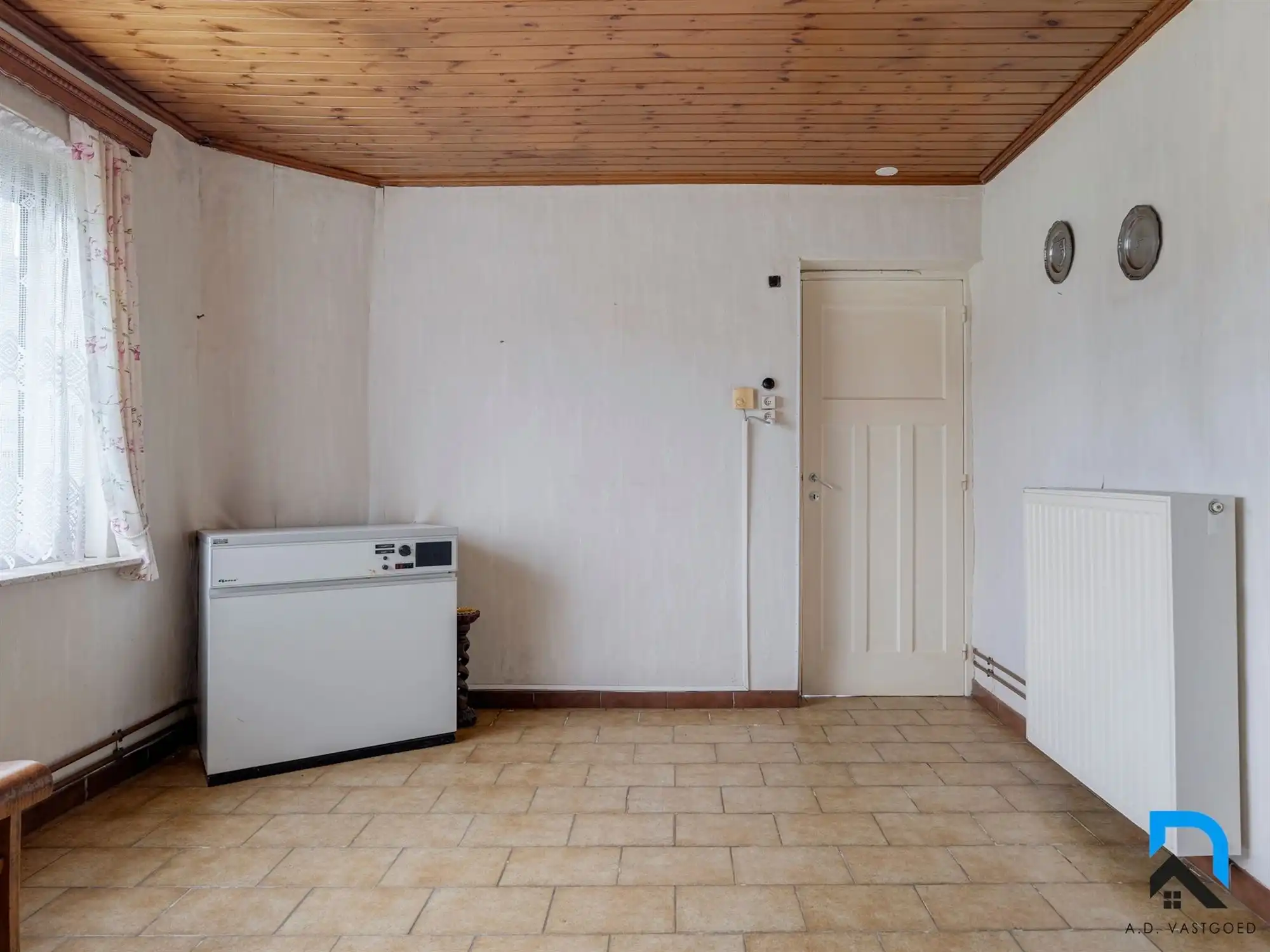 Te renoveren woning met grote tuin in Zwartberg foto 10