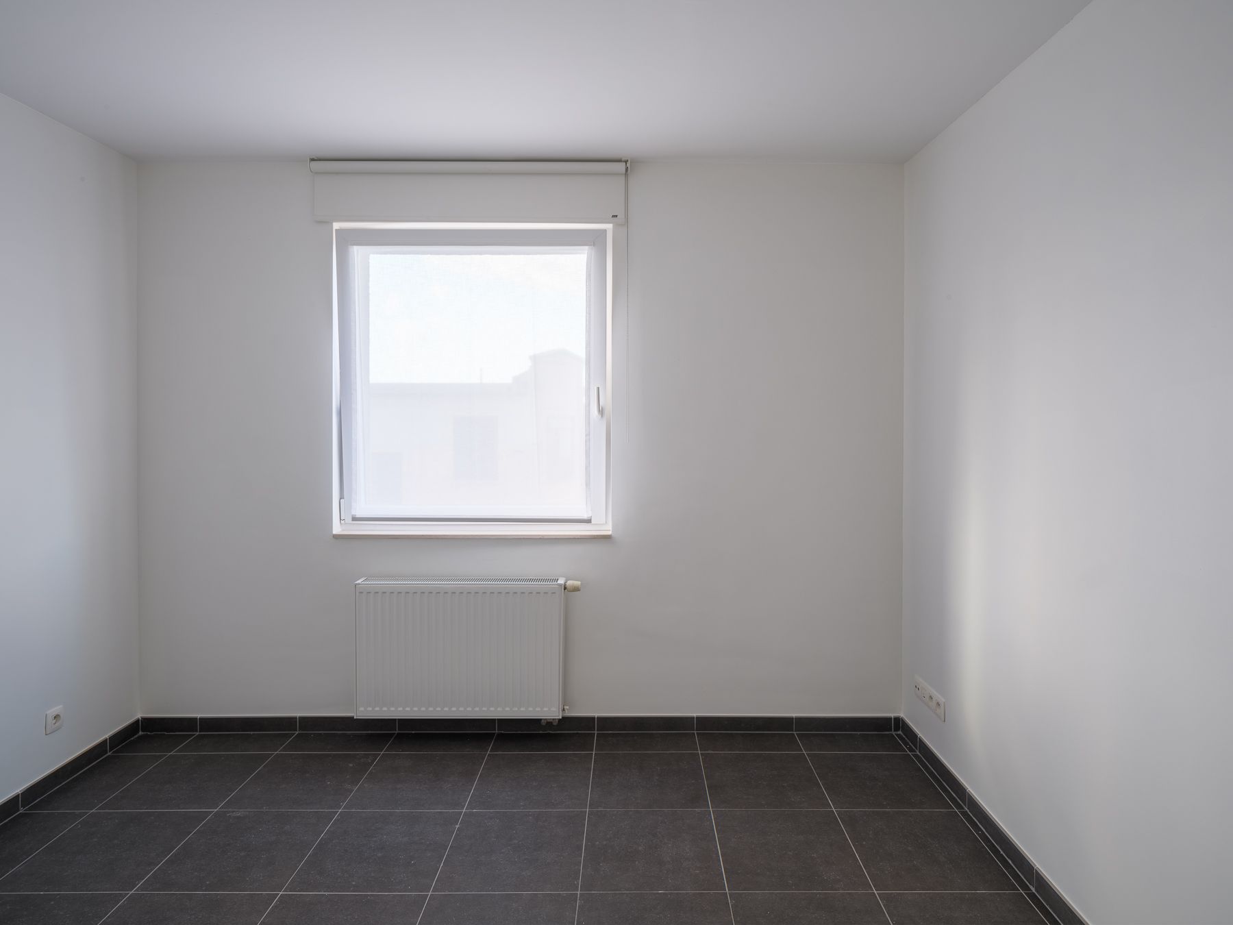 Instapklaar éénslaapkamerappartement met terras en autostaanplaats foto 11