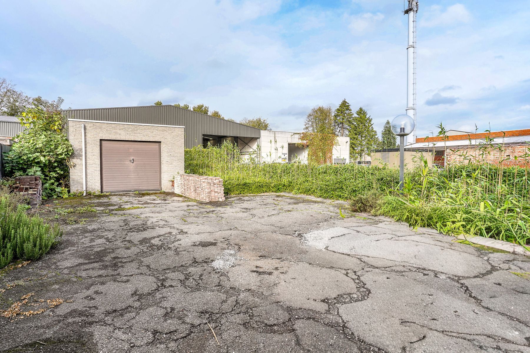 Veelzijdig, zeer ruim pand (handel én woonst) met tal van mogelijkheden in centrum Malderen! foto 37