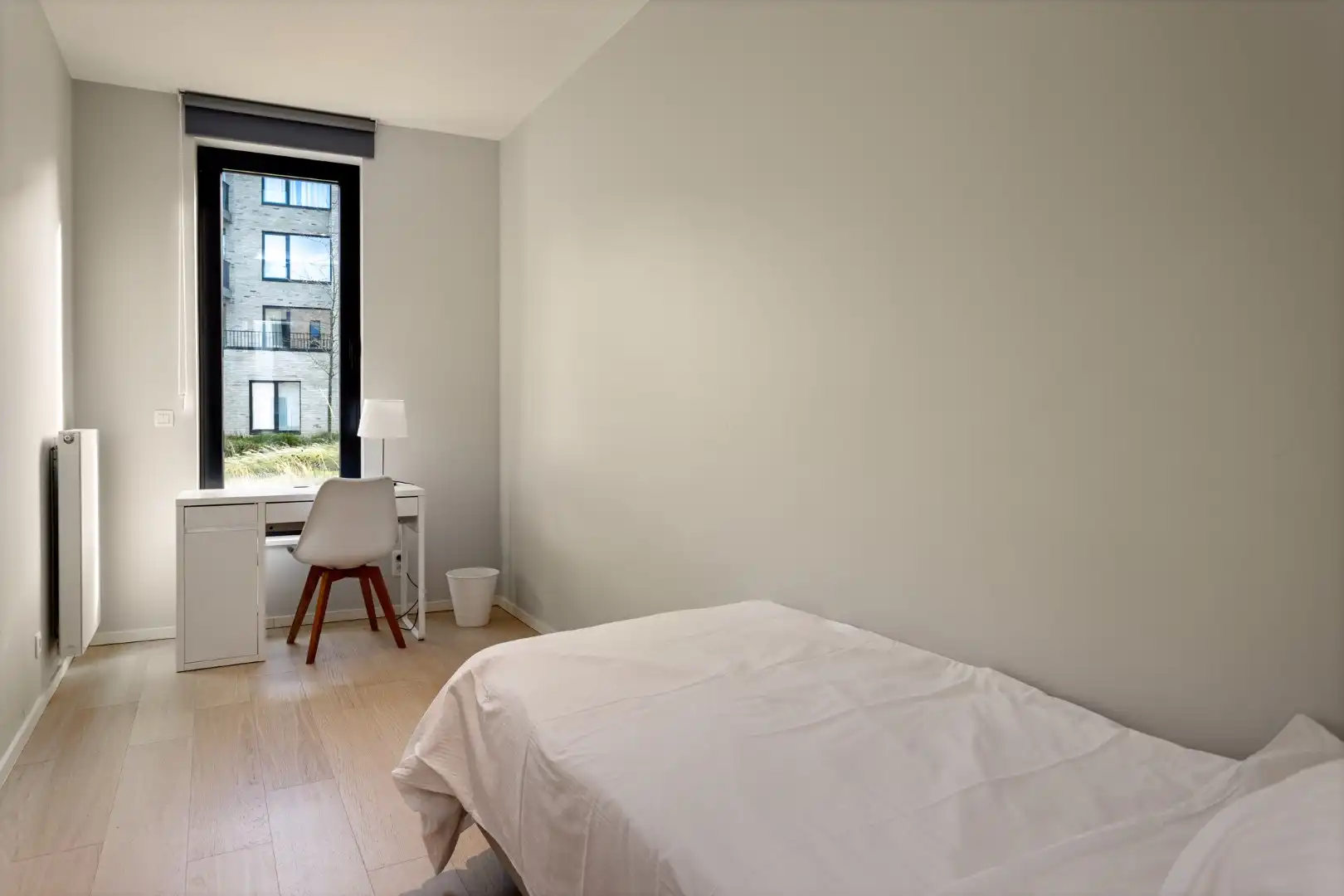 3- slaapkamer appartement gelegen te midden van het groen met privatieve tuin. foto 10