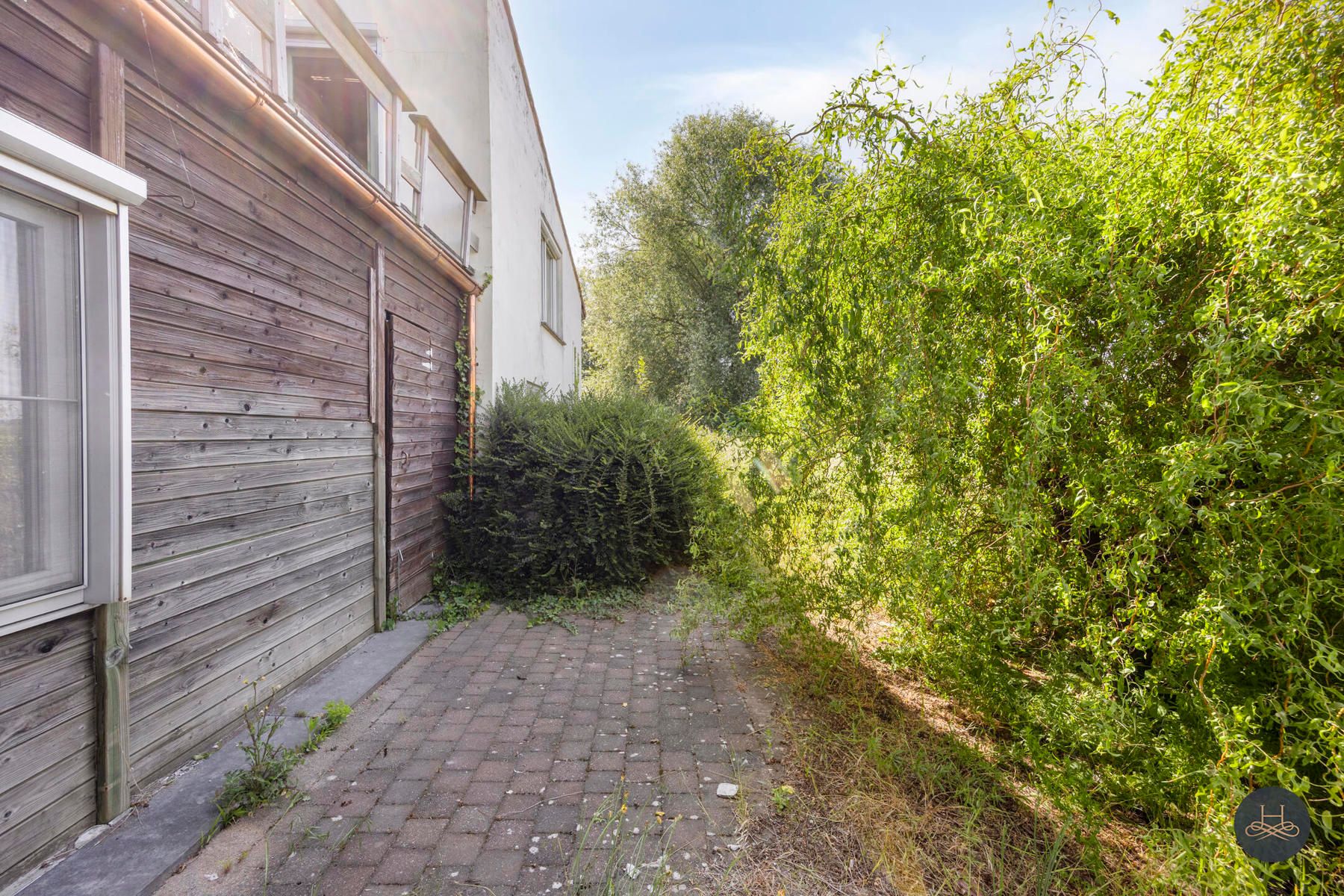 Op te knappen woning met uitzicht op de Dijle te Rotselaar foto 27