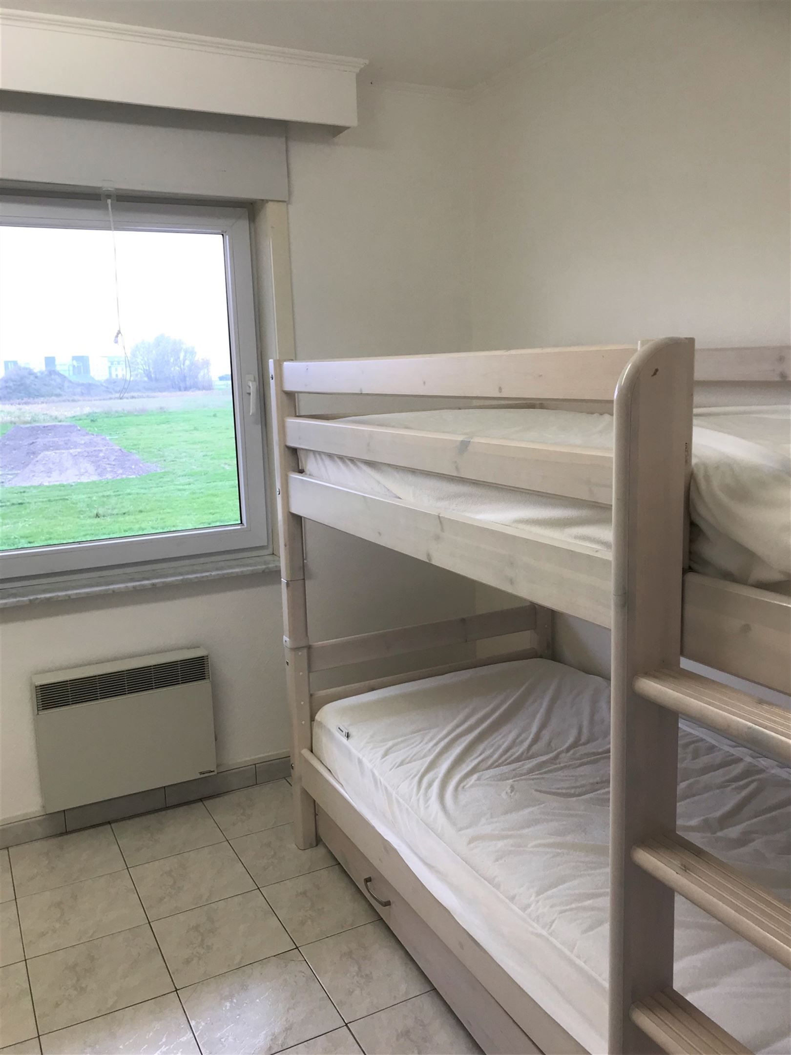 2 slaapkamerappartement te huur met garage foto 13